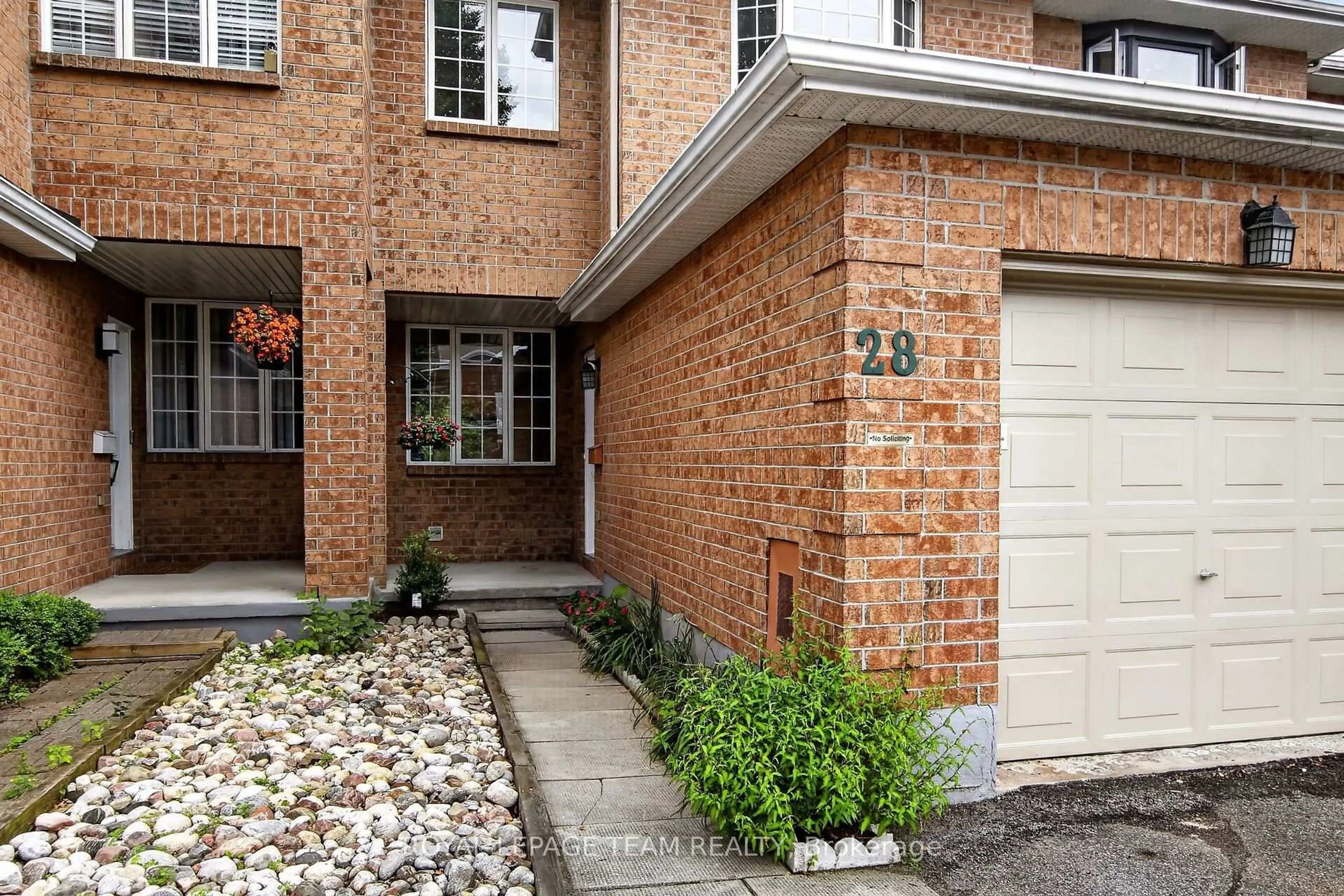 Home with brick exterior material, street for 28 Cohen Ave, Kanata Ontario K2L 4E9