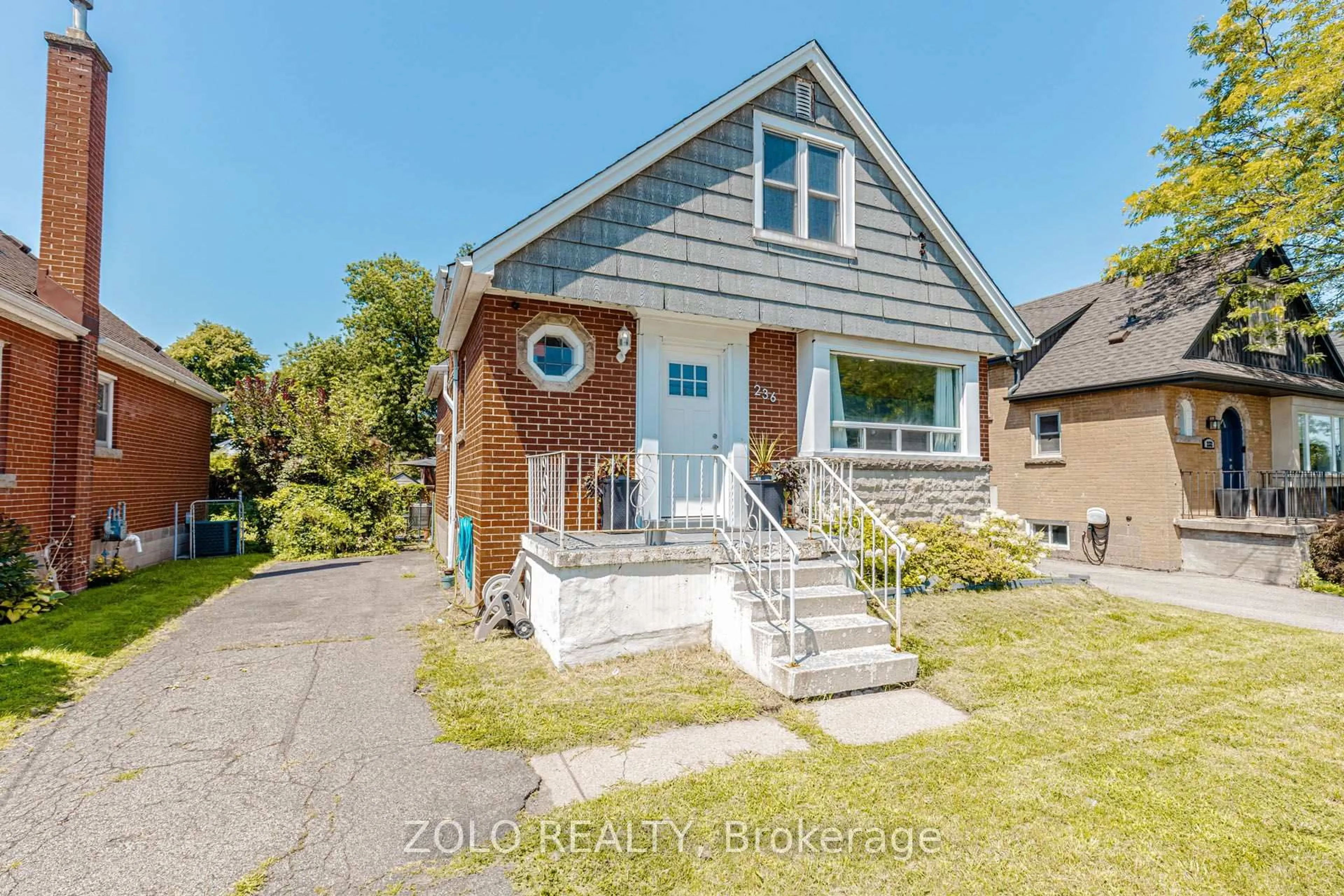 Home with brick exterior material, street for 236 Parkdale Ave, Hamilton Ontario L8K 3P6