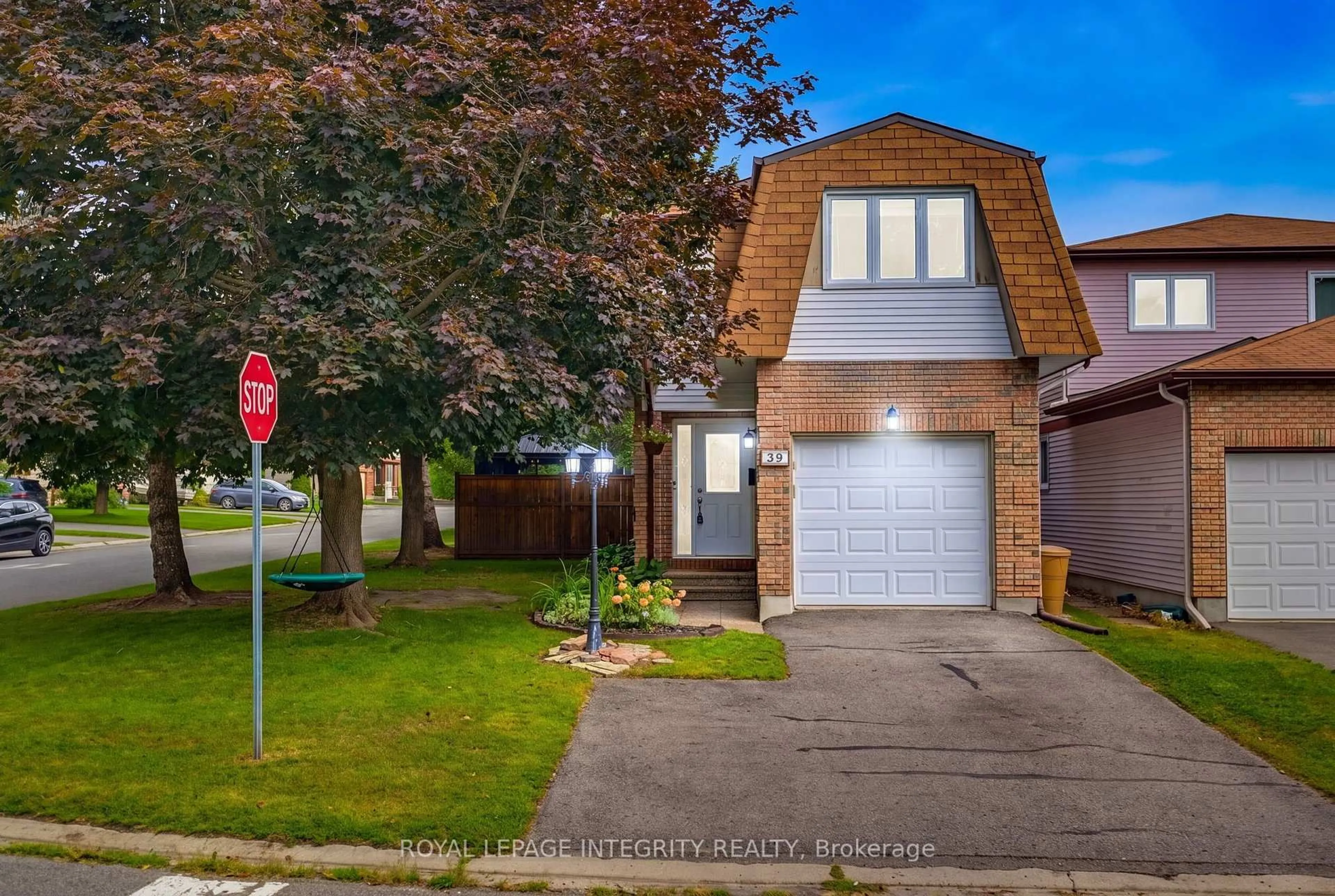 Home with brick exterior material, street for 39 Ready Way, Ottawa Ontario K2J 2R7