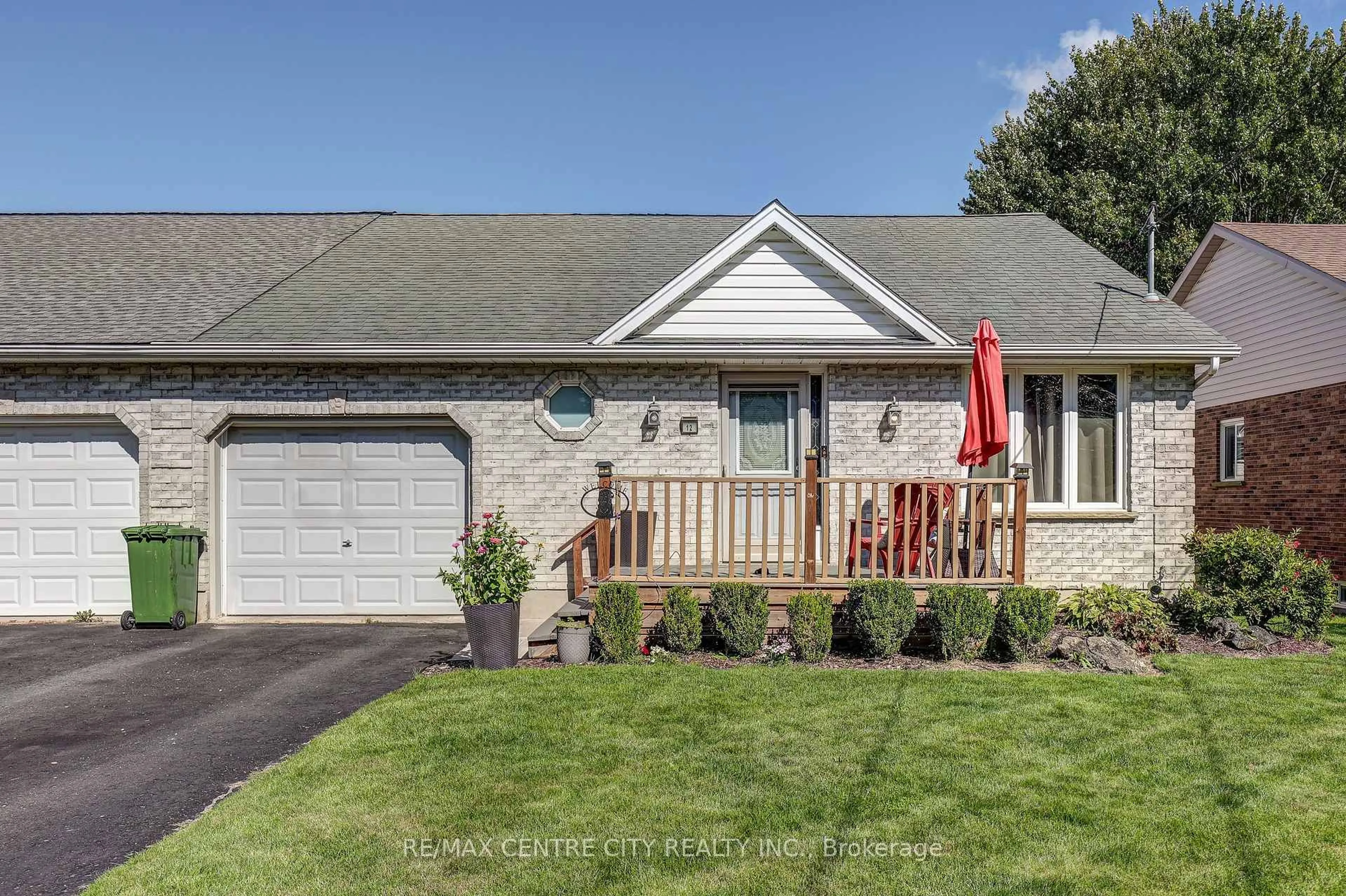 Home with vinyl exterior material, street for 12 Second Ave, St. Thomas Ontario N5R 6A2