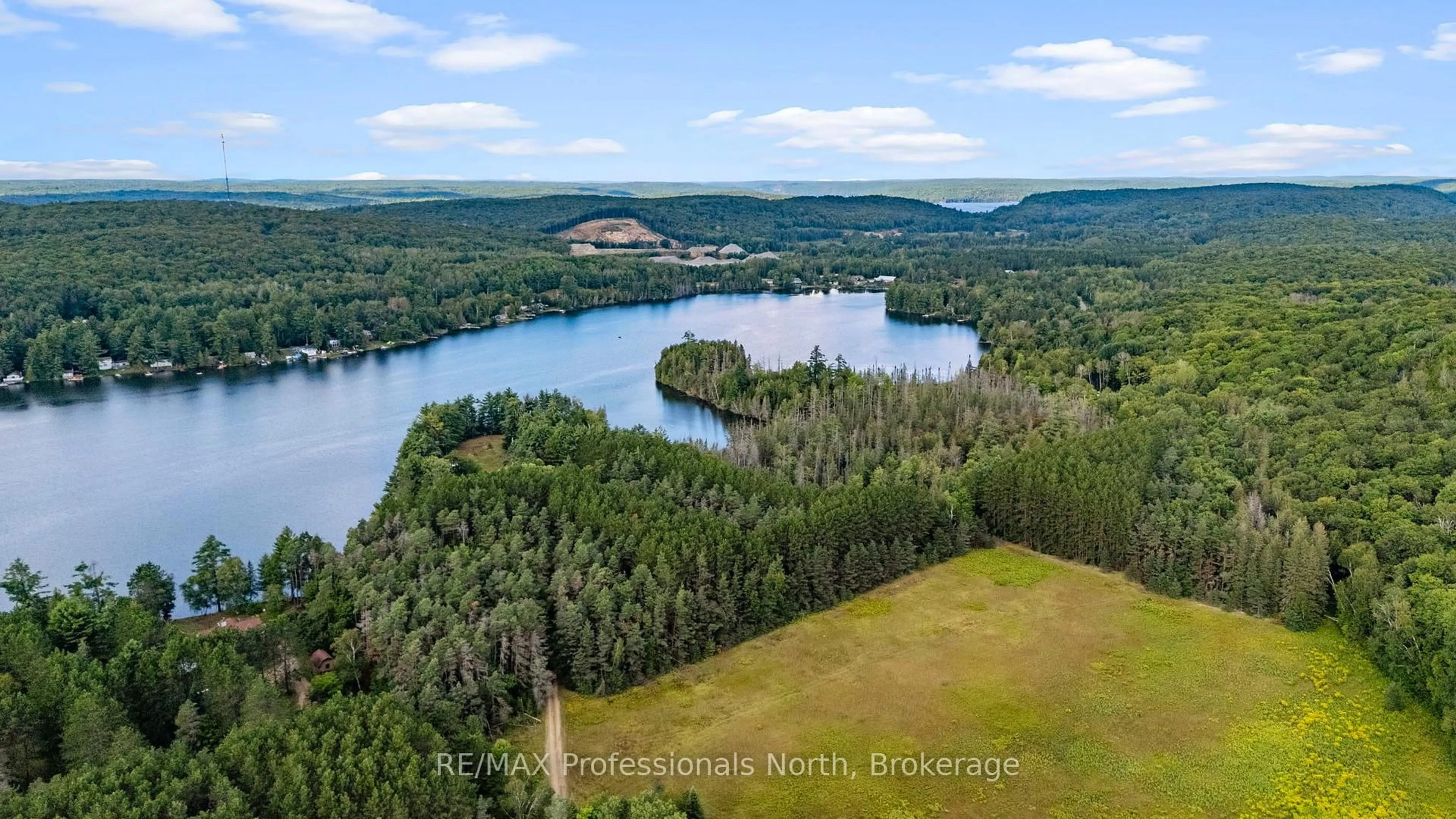 A pic from outside/outdoor area/front of a property/back of a property/a pic from drone, water/lake/river/ocean view for 1014 Log Cabin Lane, Dysart et al Ontario K0M 1S0