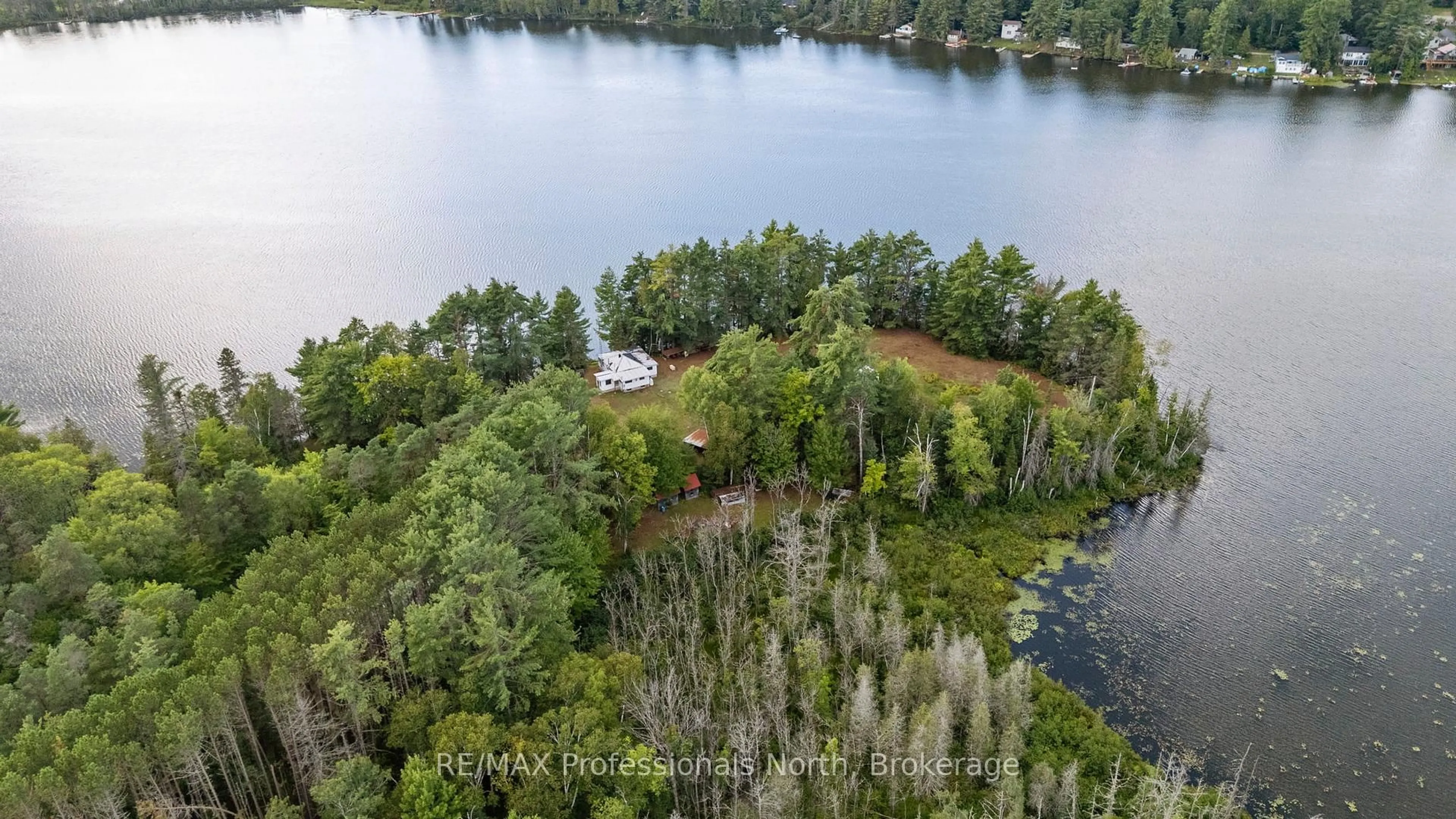 A pic from outside/outdoor area/front of a property/back of a property/a pic from drone, water/lake/river/ocean view for 1014 Log Cabin Lane, Dysart et al Ontario K0M 1S0
