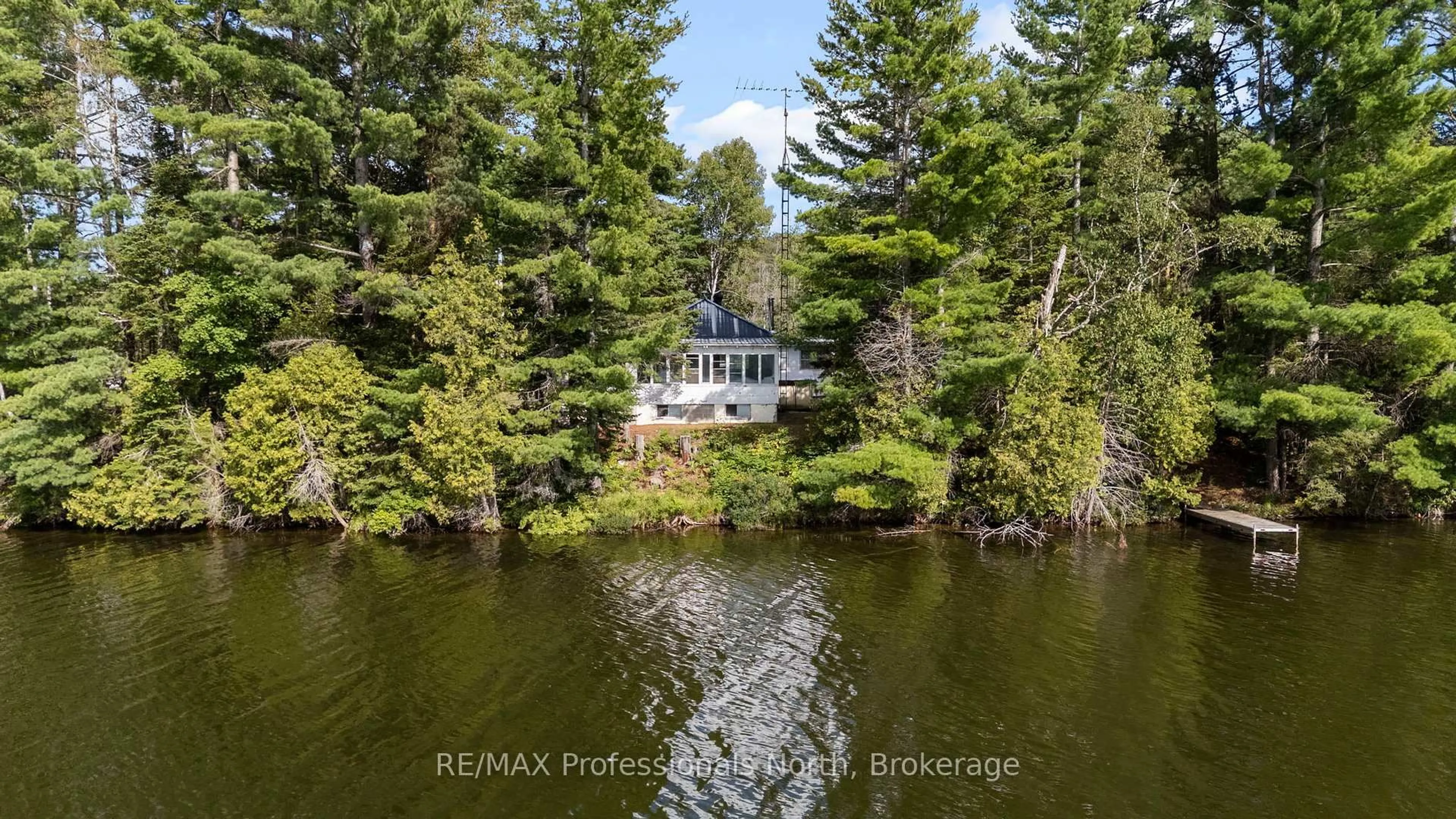 A pic from outside/outdoor area/front of a property/back of a property/a pic from drone, water/lake/river/ocean view for 1014 Log Cabin Lane, Dysart et al Ontario K0M 1S0