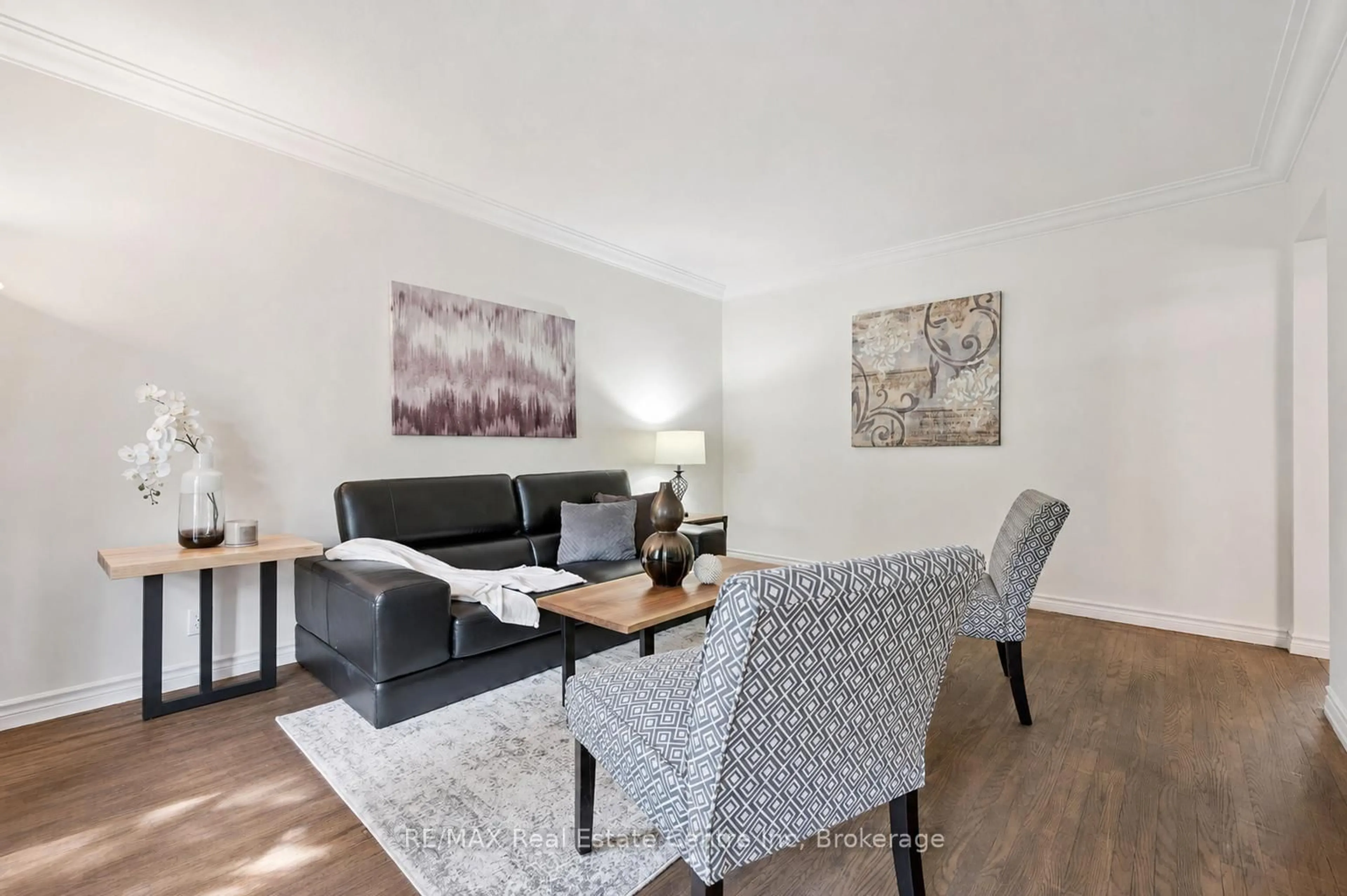 Living room with furniture, wood/laminate floor for 277 KATHLEEN St, Guelph Ontario N1H 4Y7