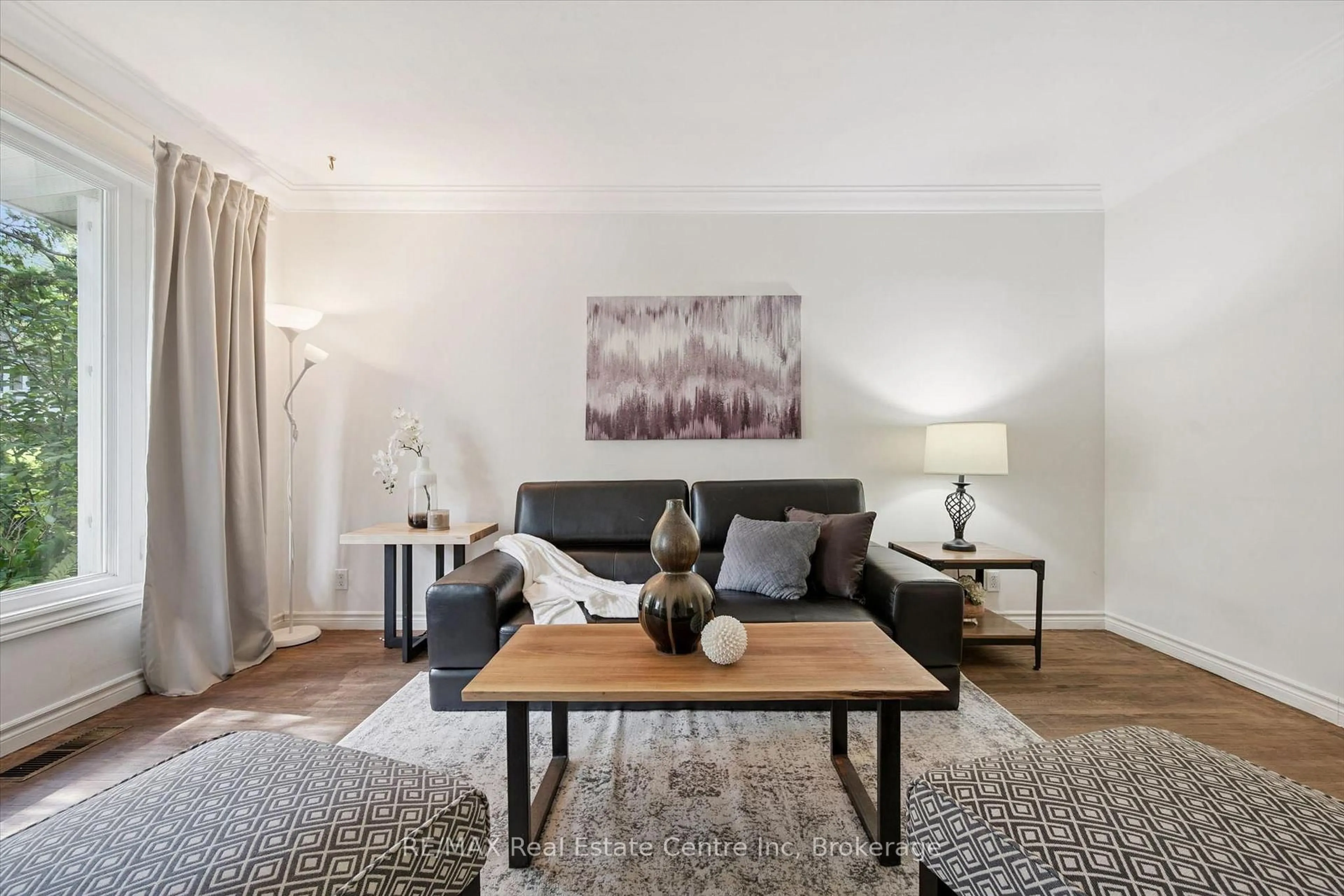 Living room with furniture, wood/laminate floor for 277 KATHLEEN St, Guelph Ontario N1H 4Y7
