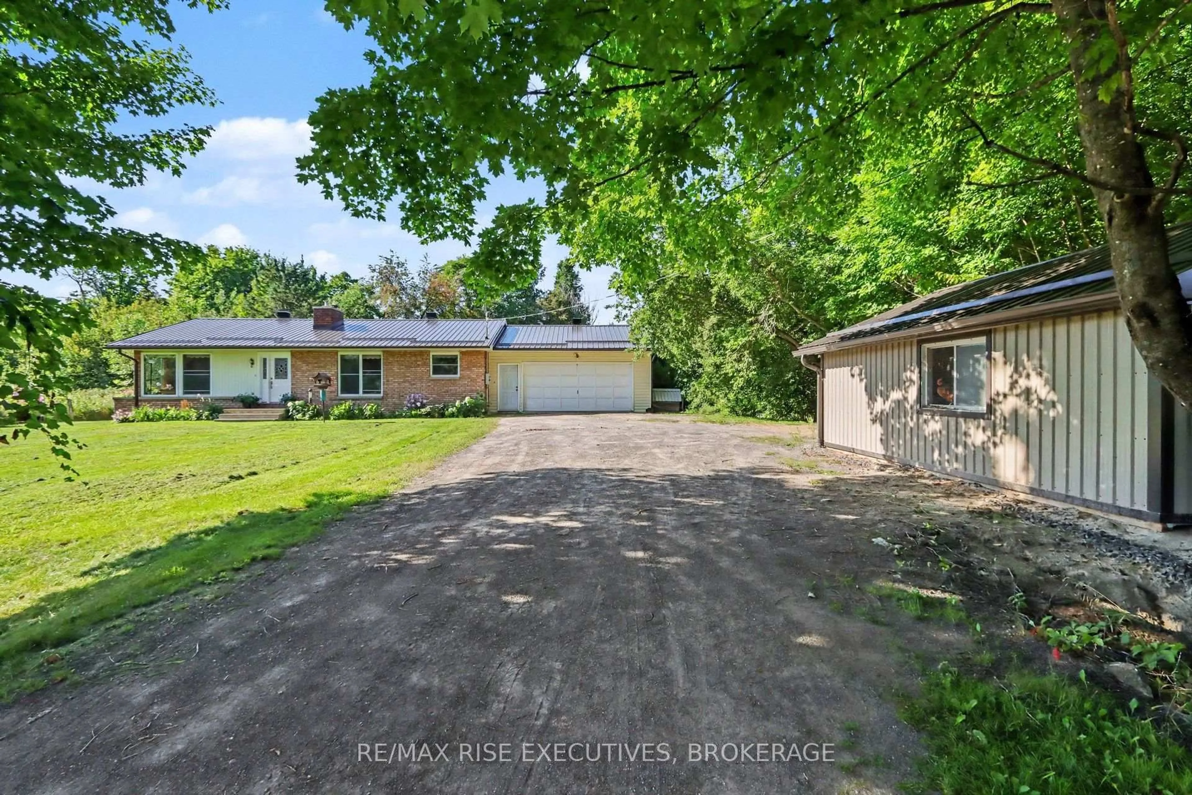 A pic from outside/outdoor area/front of a property/back of a property/a pic from drone, street for 715 Hanna Rd, Maberly Ontario K0H 2B0