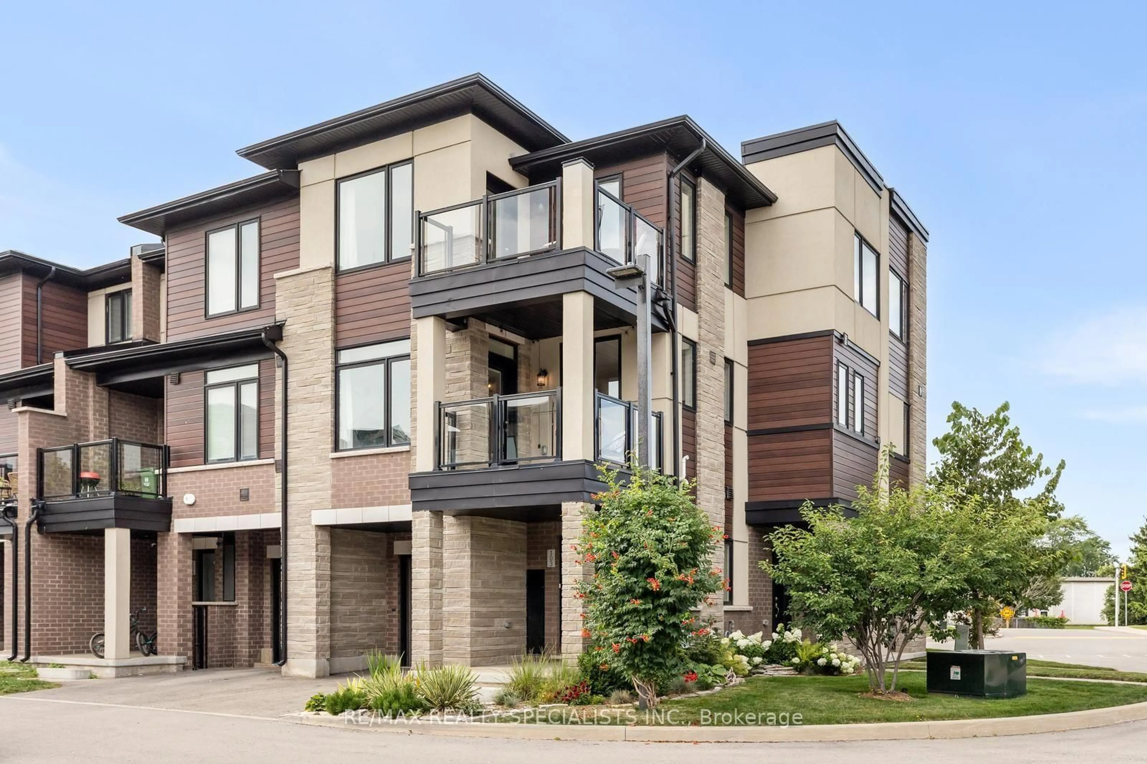 Home with brick exterior material, street for 590 North Service Rd #103, Hamilton Ontario L8E 0K5