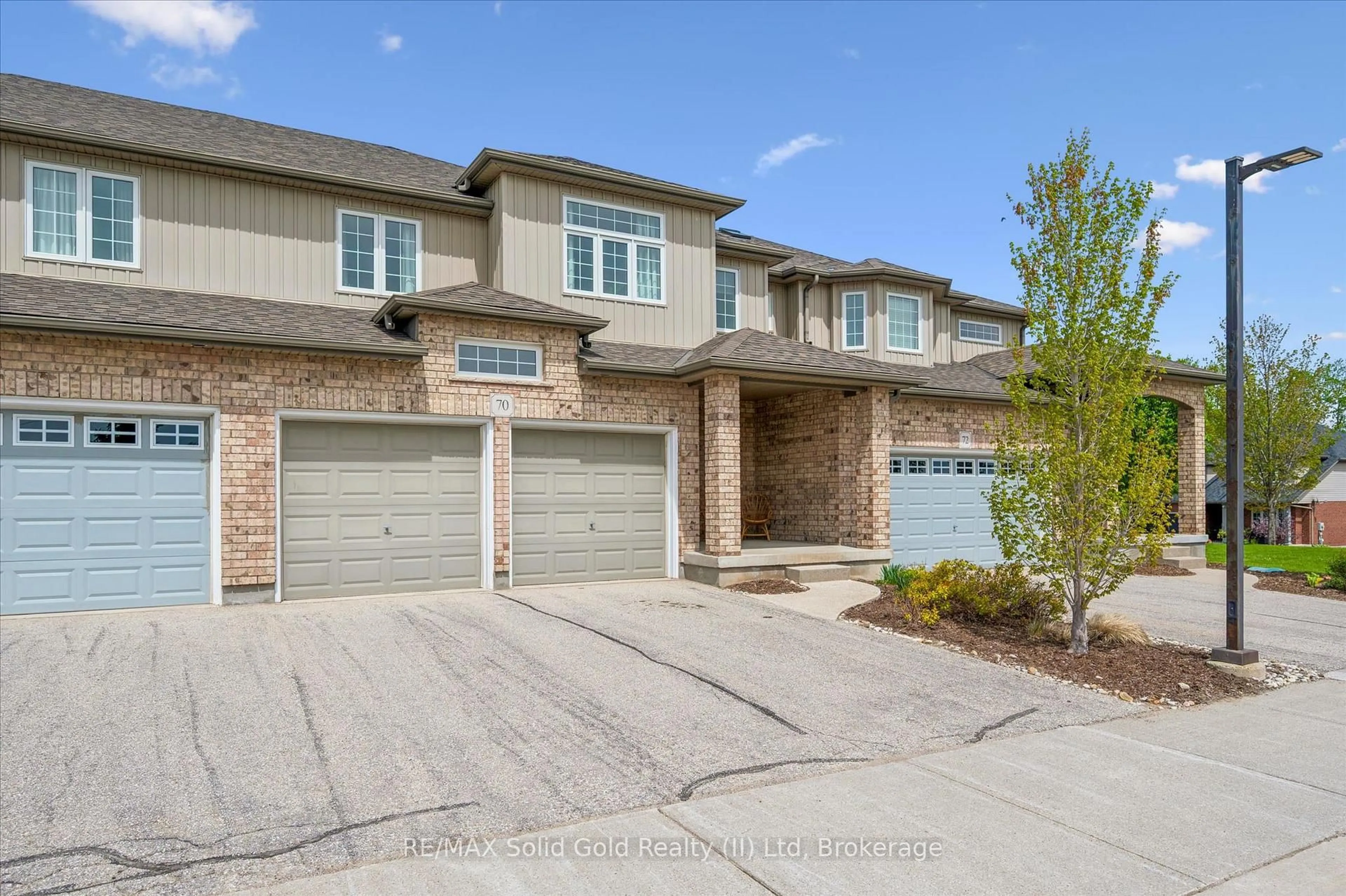 Home with brick exterior material, street for 31 Townsend Dr #70, Woolwich Ontario N0B 1M0