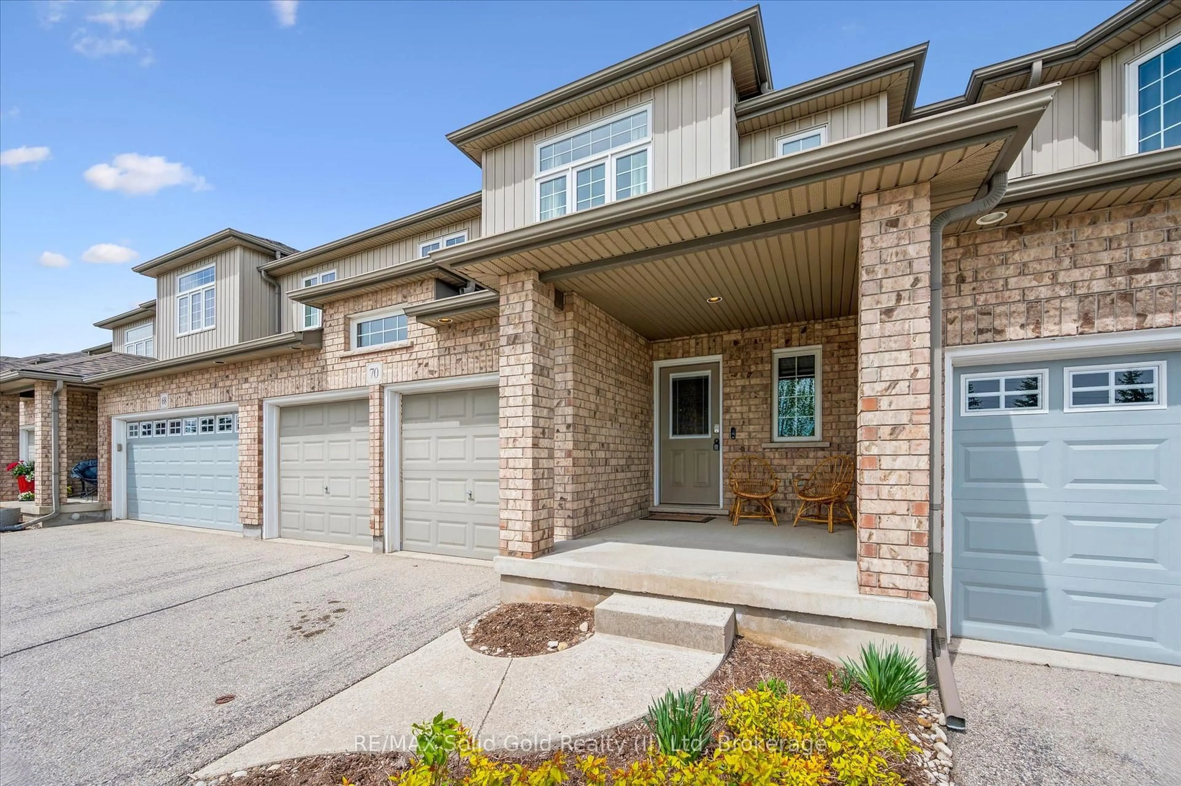 Home with brick exterior material, street for 31 Townsend Dr #70, Woolwich Ontario N0B 1M0