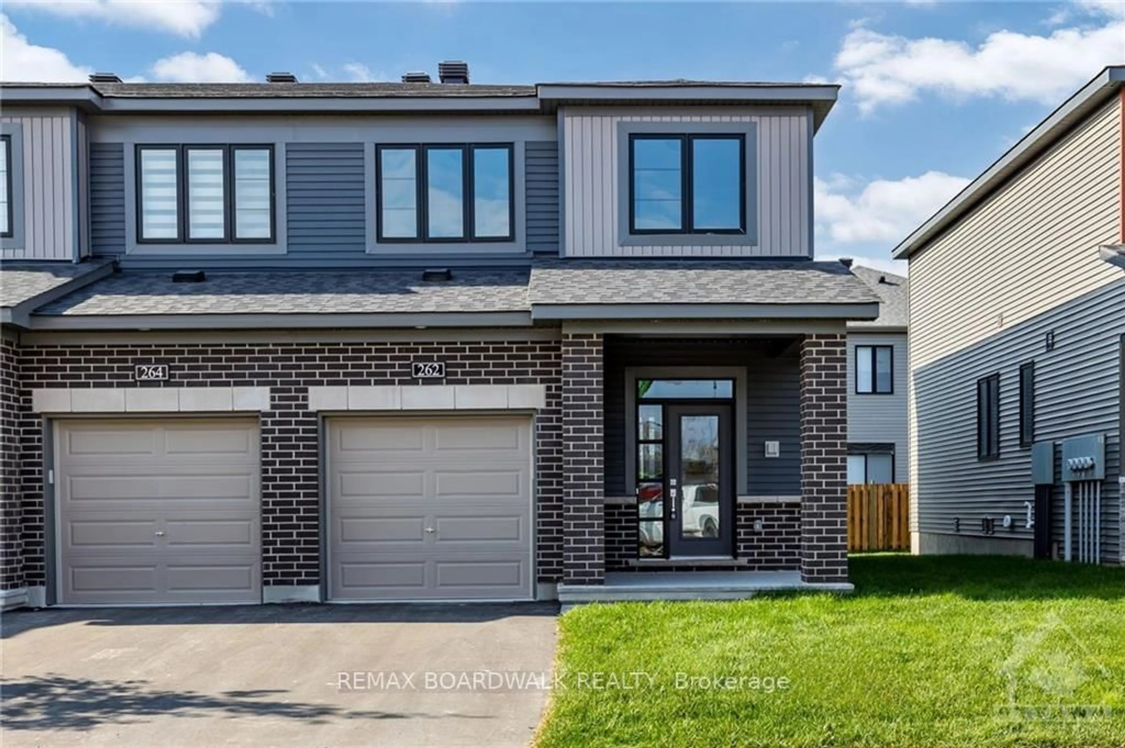 Home with brick exterior material, street for 262 TULLAGHAN Hts, Ottawa Ontario K2J 7C2