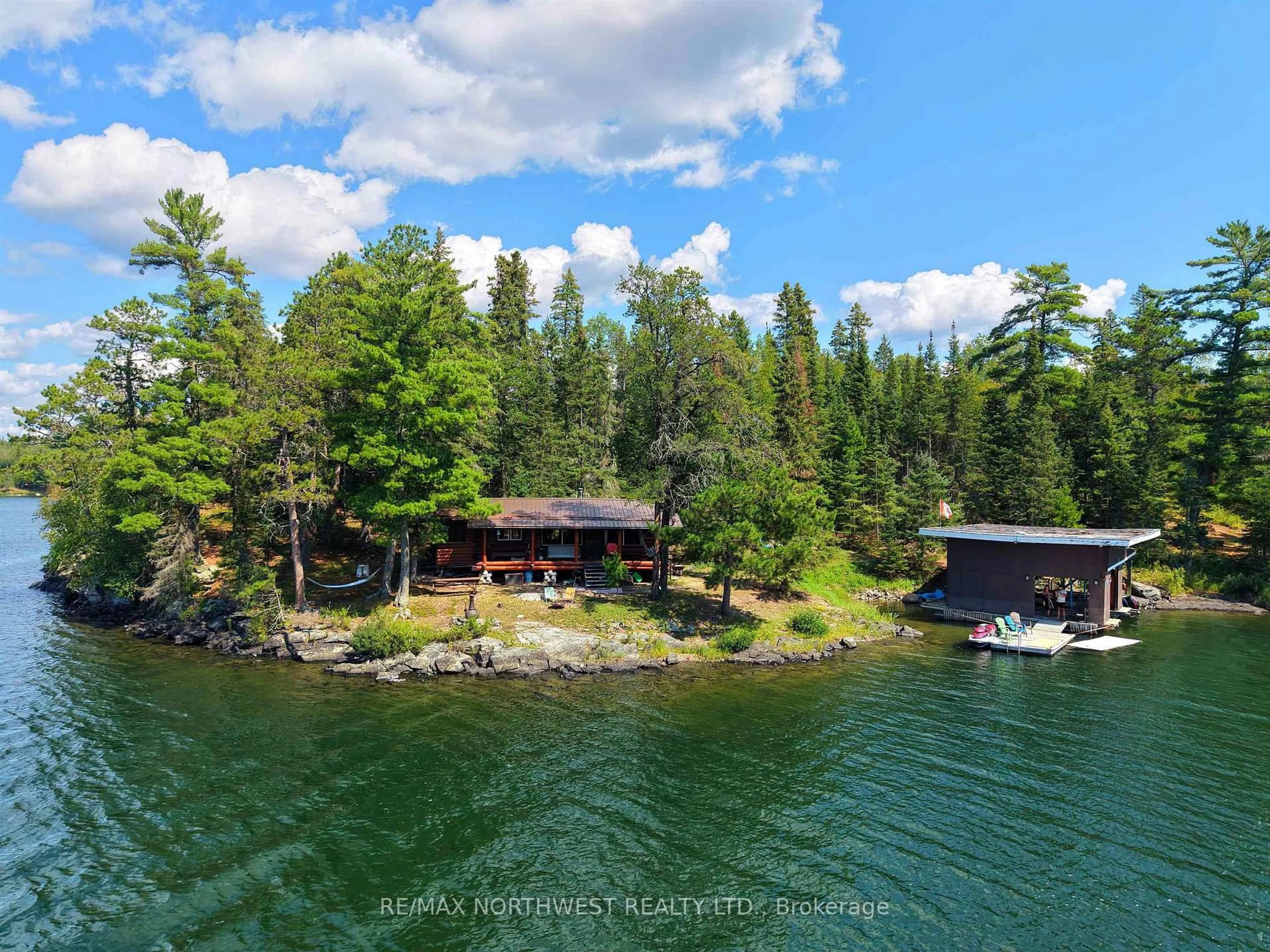 A pic from outside/outdoor area/front of a property/back of a property/a pic from drone, water/lake/river/ocean view for 68 Whitefish Bay Island, Sioux Narrows-Nestor Falls Ontario P0X 1N0