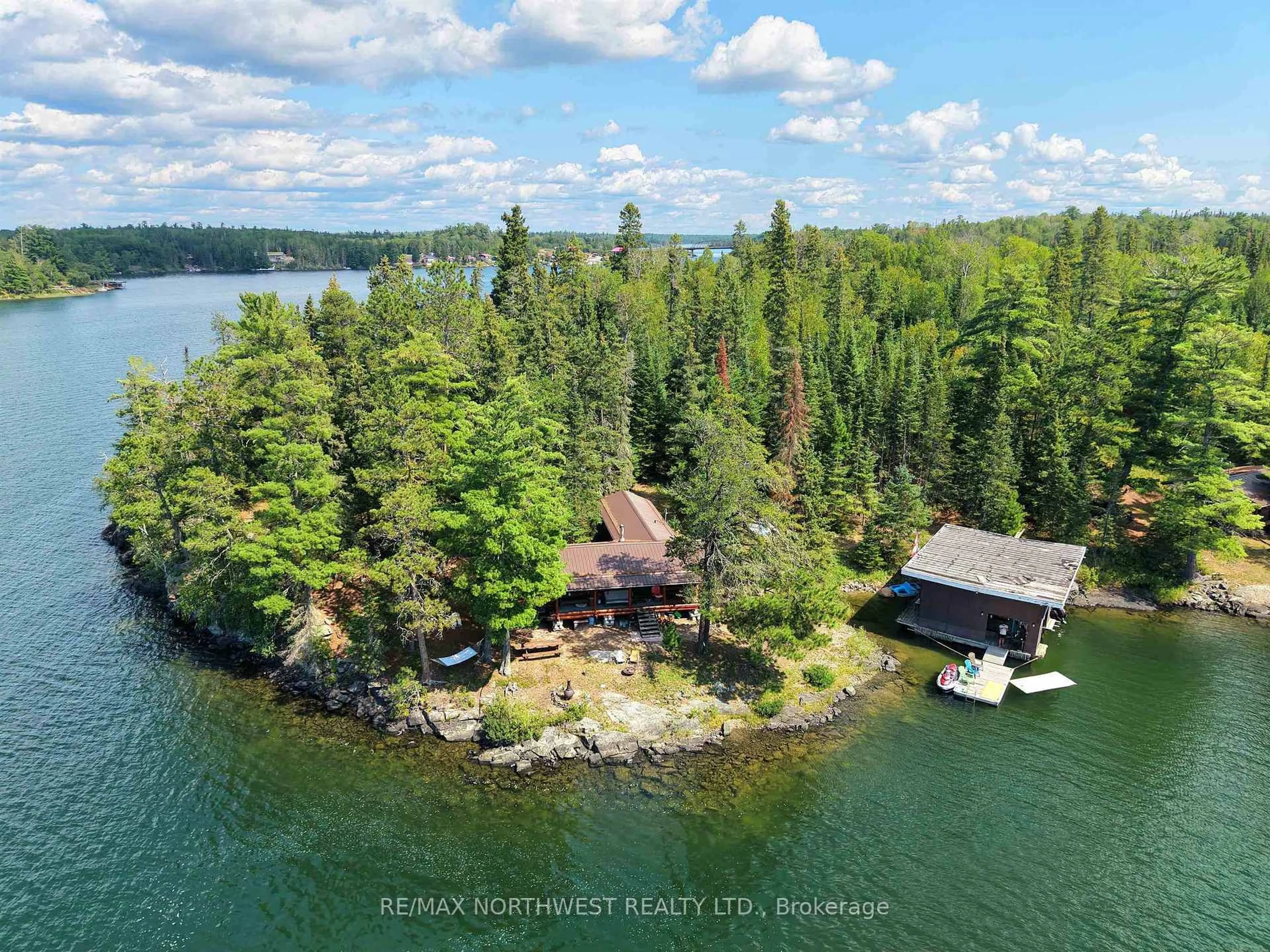 A pic from outside/outdoor area/front of a property/back of a property/a pic from drone, water/lake/river/ocean view for 68 Whitefish Bay Island, Sioux Narrows-Nestor Falls Ontario P0X 1N0