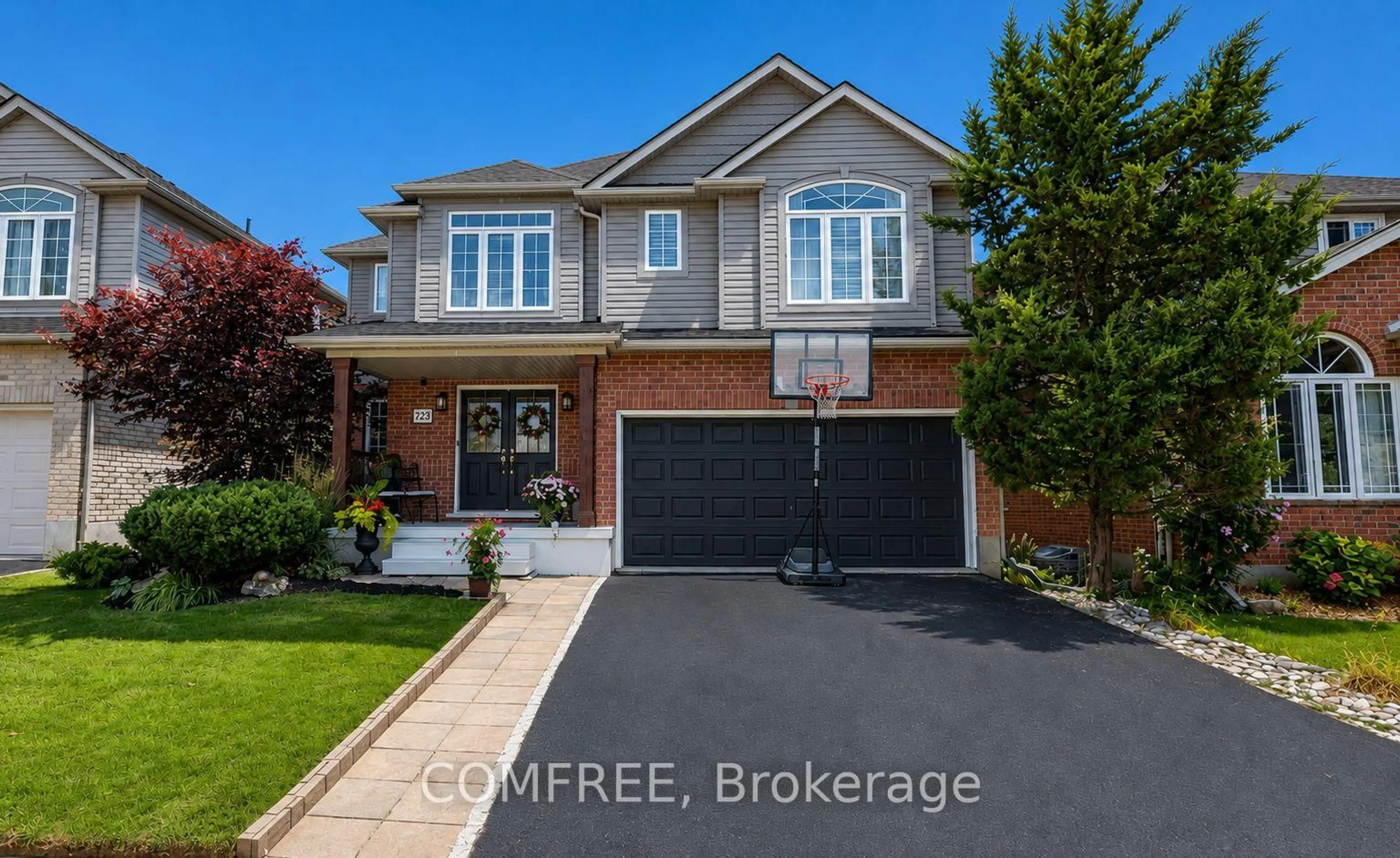 Home with brick exterior material, street for 723 Munich Circ, Waterloo Ontario N2V 2N6
