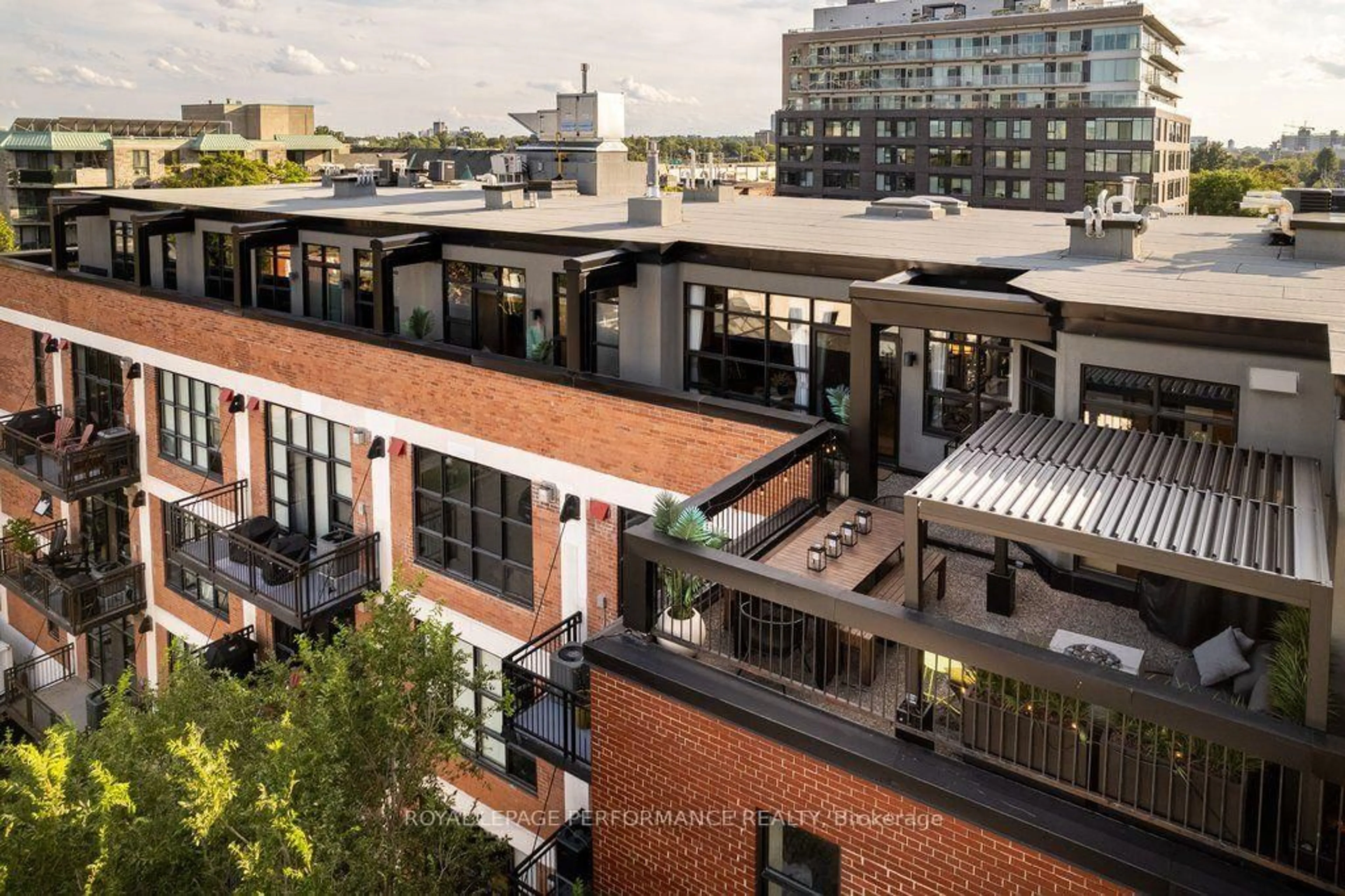Patio, city buildings view from balcony for 255 Argyle Ave #PH4 & PH6, Ottawa Ontario K2P 2N7