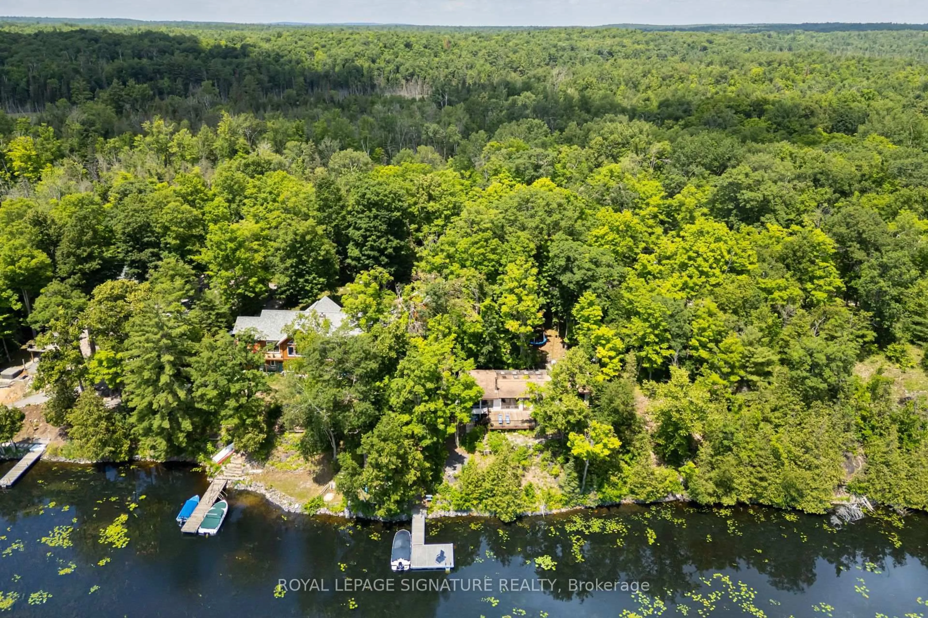 A pic from outside/outdoor area/front of a property/back of a property/a pic from drone, water/lake/river/ocean view for 383 Fire Route 59 Rte, Havelock-Belmont-Methuen Ontario K0L 1Z0