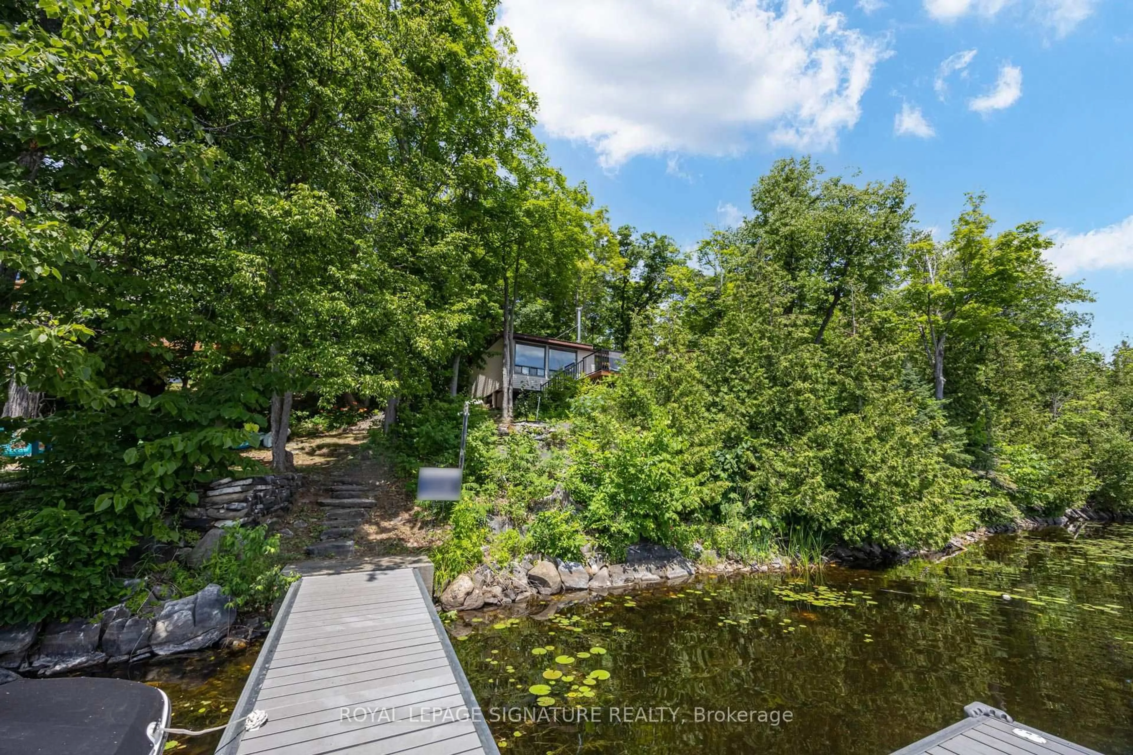 A pic from outside/outdoor area/front of a property/back of a property/a pic from drone, water/lake/river/ocean view for 383 Fire Route 59 Rte, Havelock-Belmont-Methuen Ontario K0L 1Z0