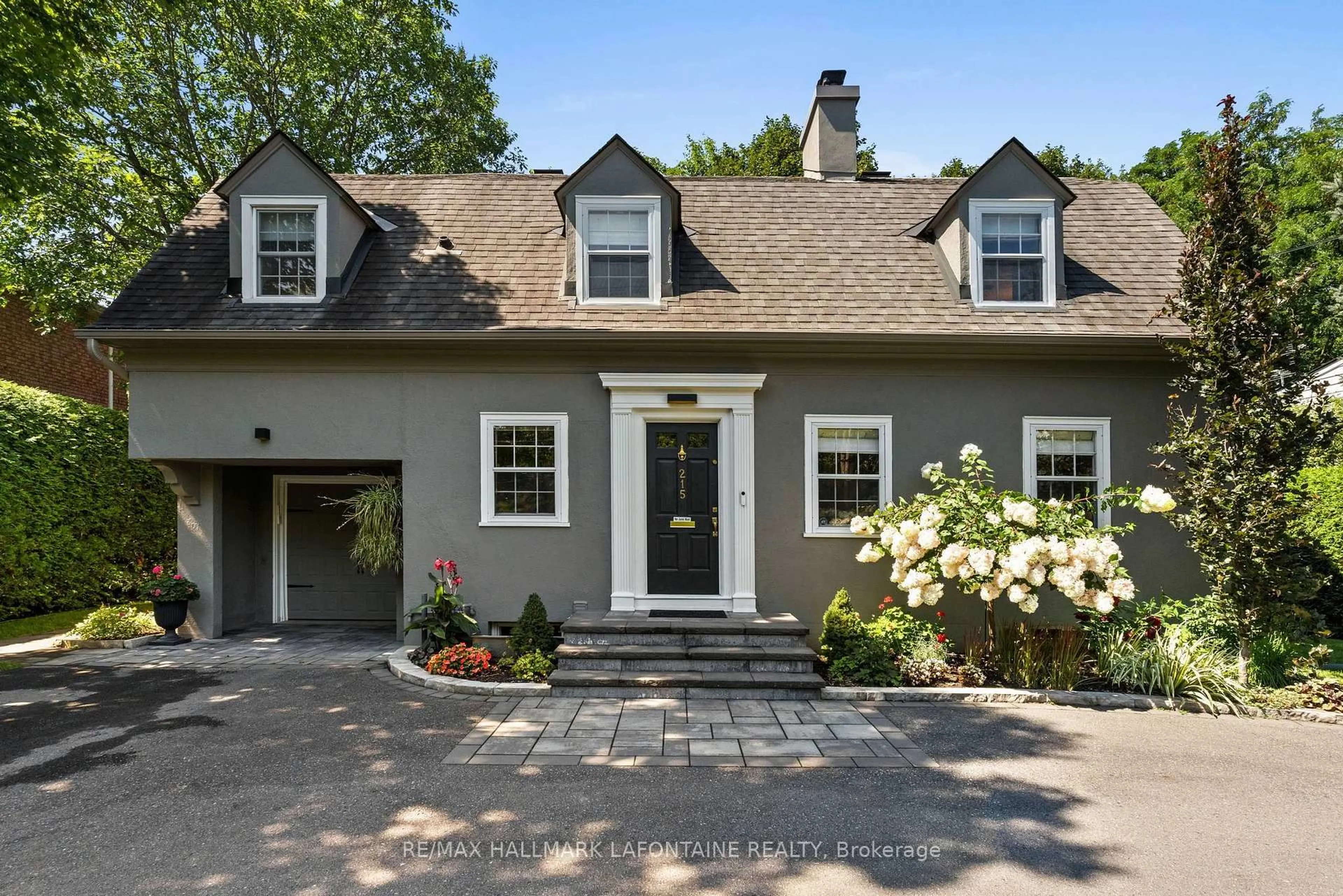Home with vinyl exterior material, street for 215 Springfield Rd, Ottawa Ontario K1M 0L1