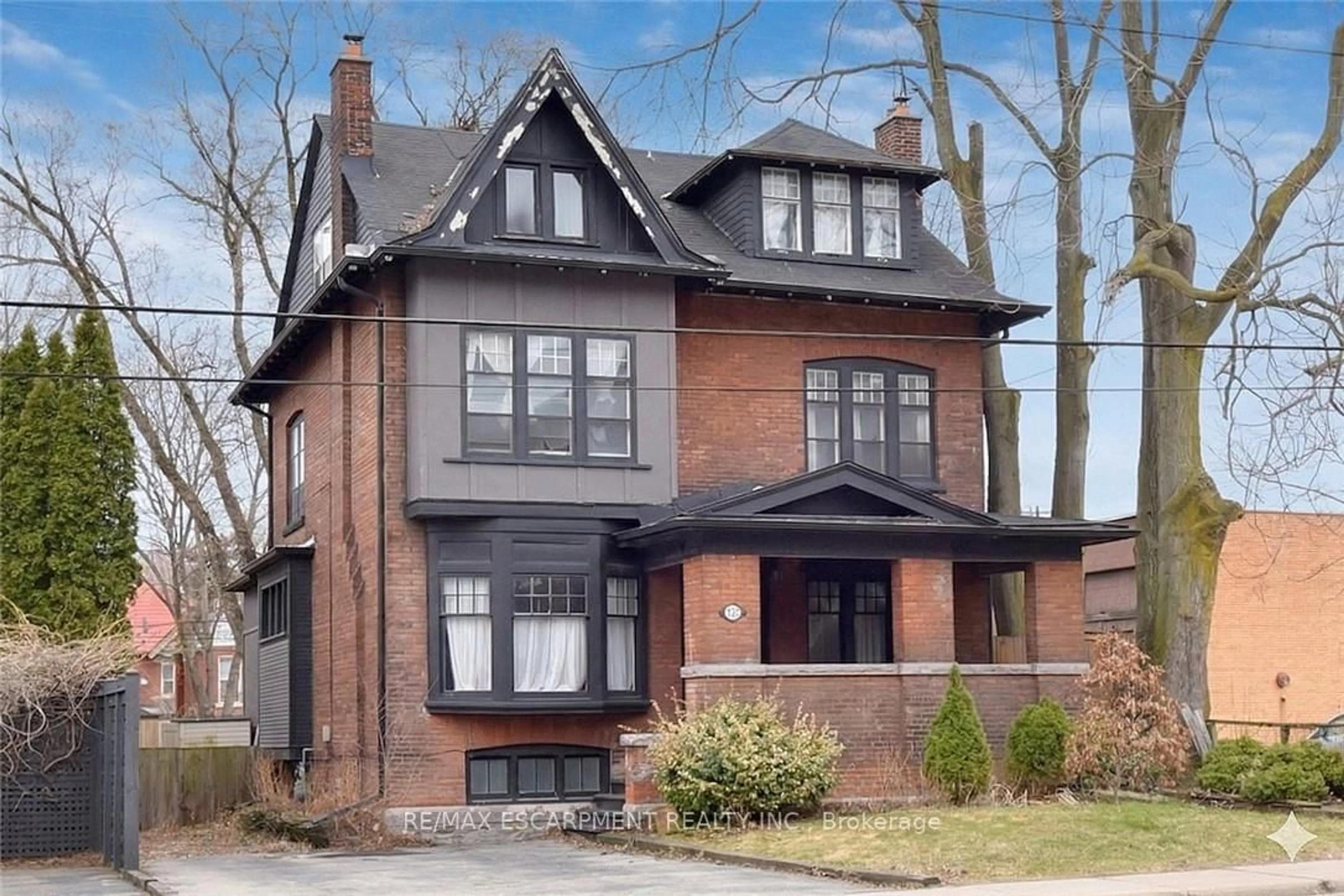 Home with brick exterior material, street for 103 Sherman Ave, Hamilton Ontario L8M 2P8