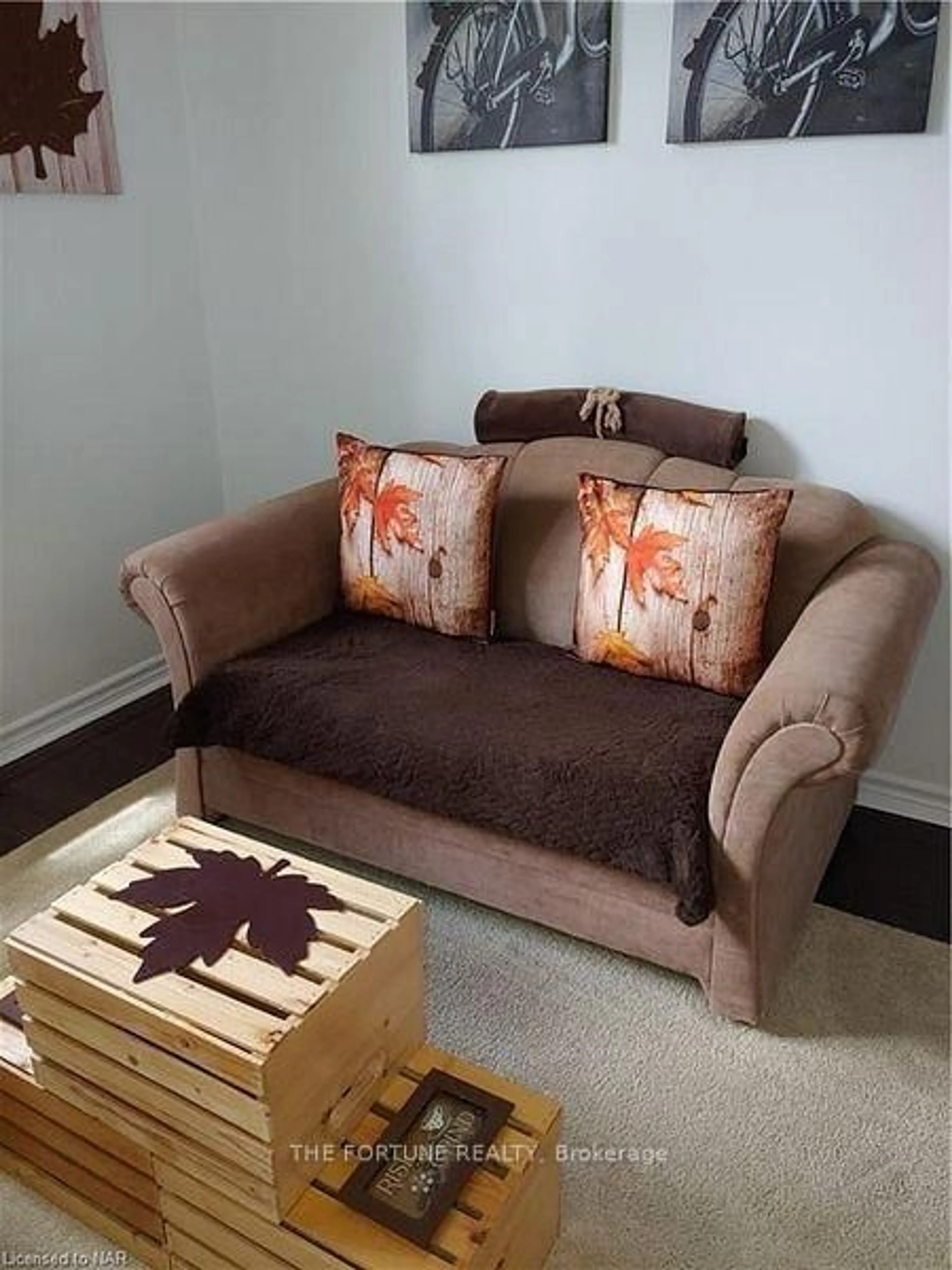 Living room with furniture, carpet floor for 4692 Crysler Ave #304, Niagara Falls Ontario L3K 5V5