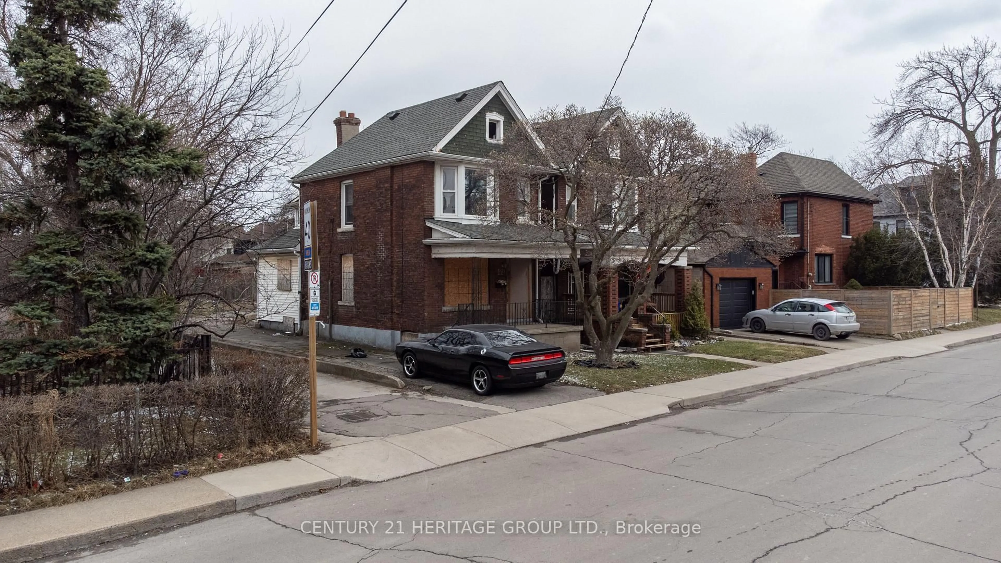 Home with brick exterior material, street for 116-120 Barnesdale Ave, Hamilton Ontario L8L 6L7