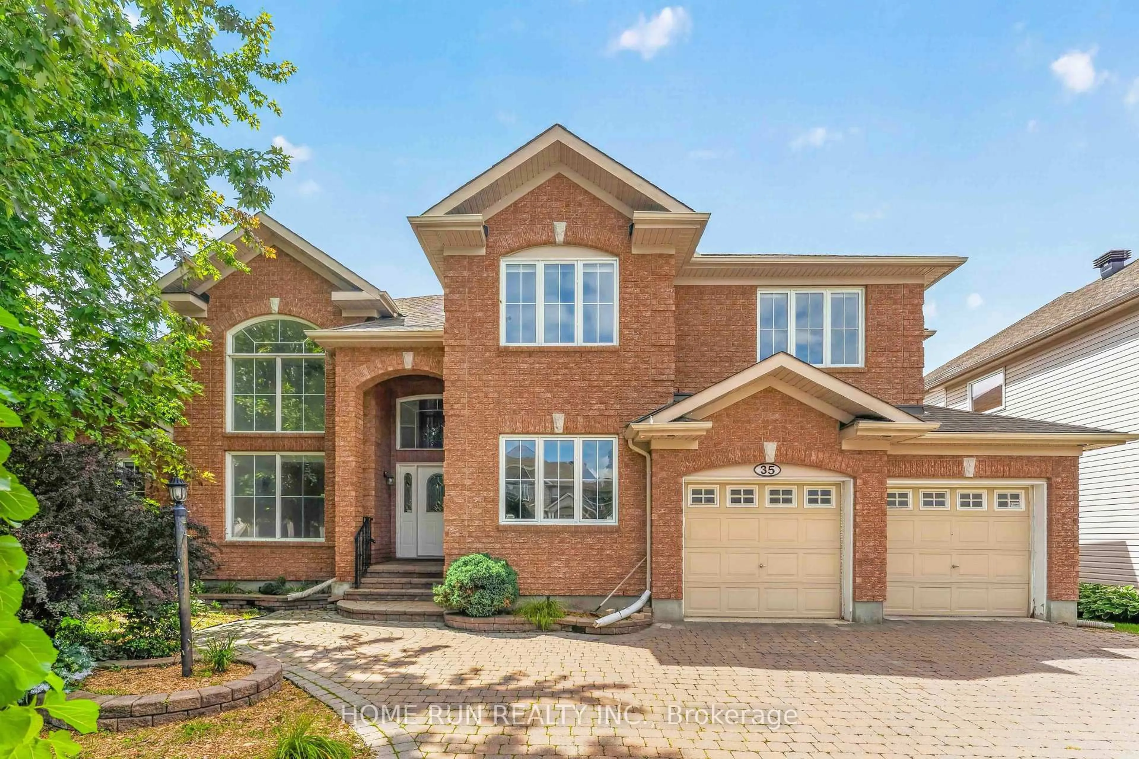 Home with brick exterior material, street for 35 Blackshire Circ, Ottawa Ontario K2J 5L8