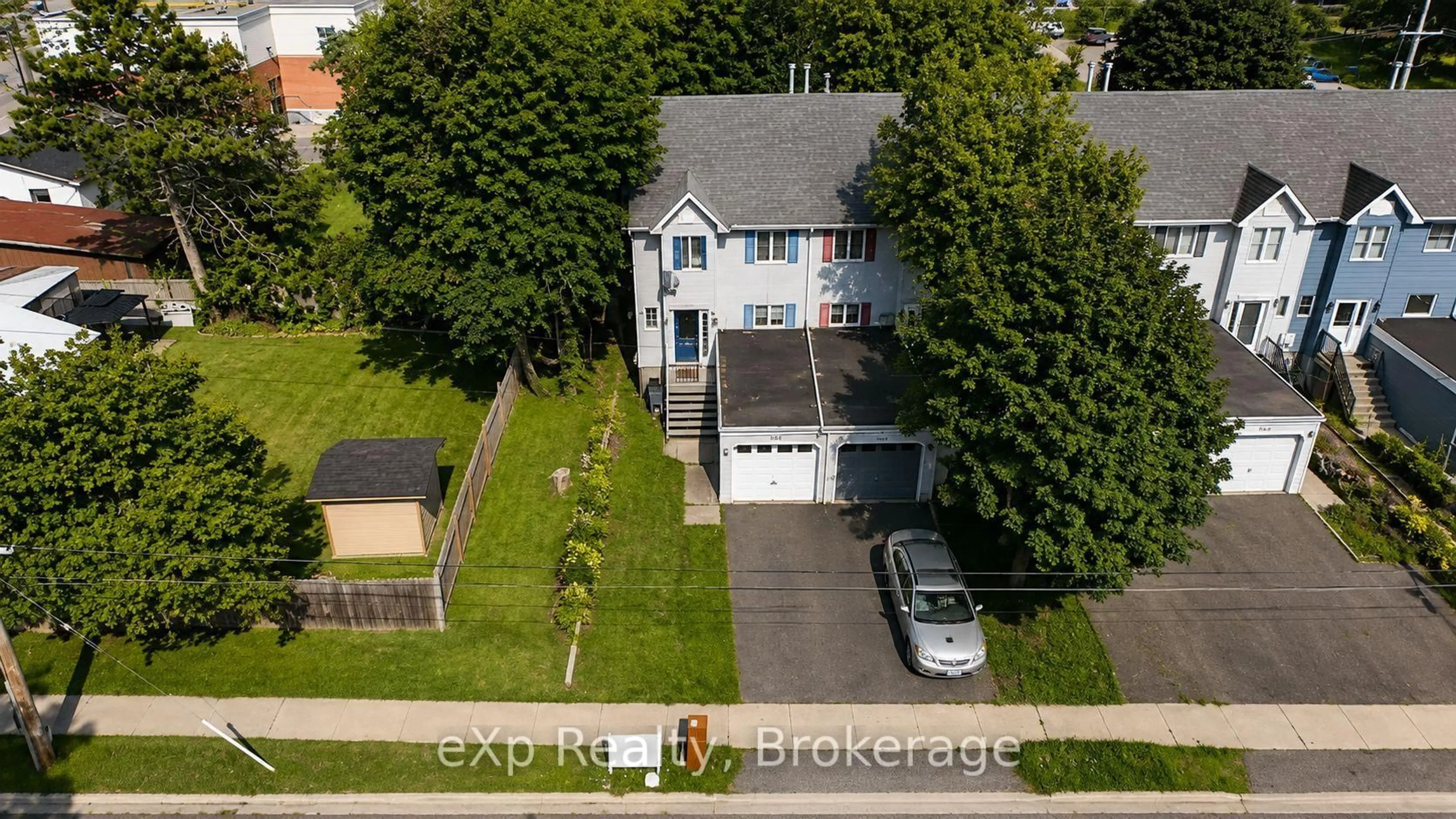 A pic from outside/outdoor area/front of a property/back of a property/a pic from drone, street for 560 John St, Gravenhurst Ontario P1P 1J9