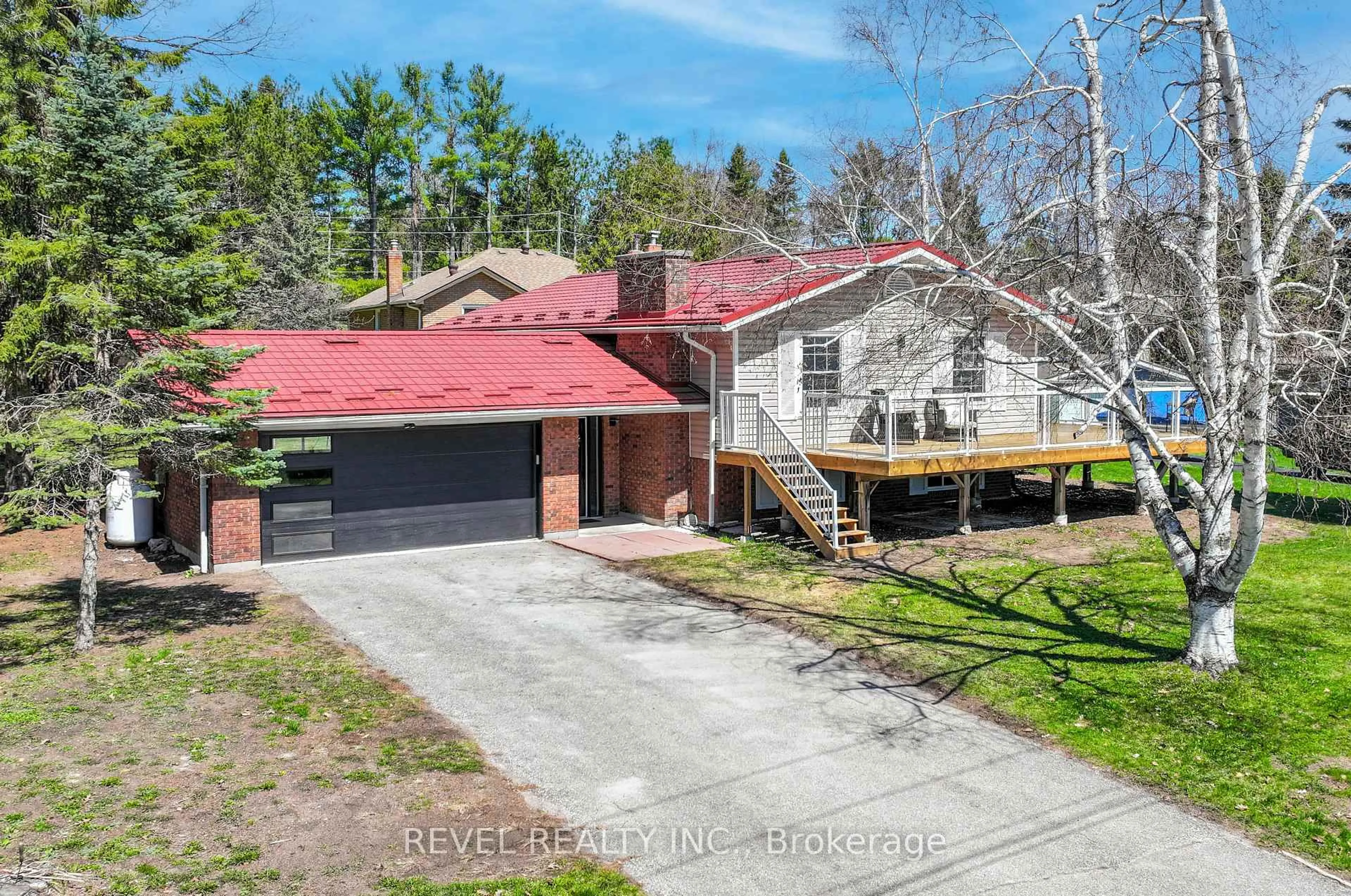 A pic from outside/outdoor area/front of a property/back of a property/a pic from drone, street for 13 Pirates Glen Dr, Trent Lakes Ontario K0M 1A0