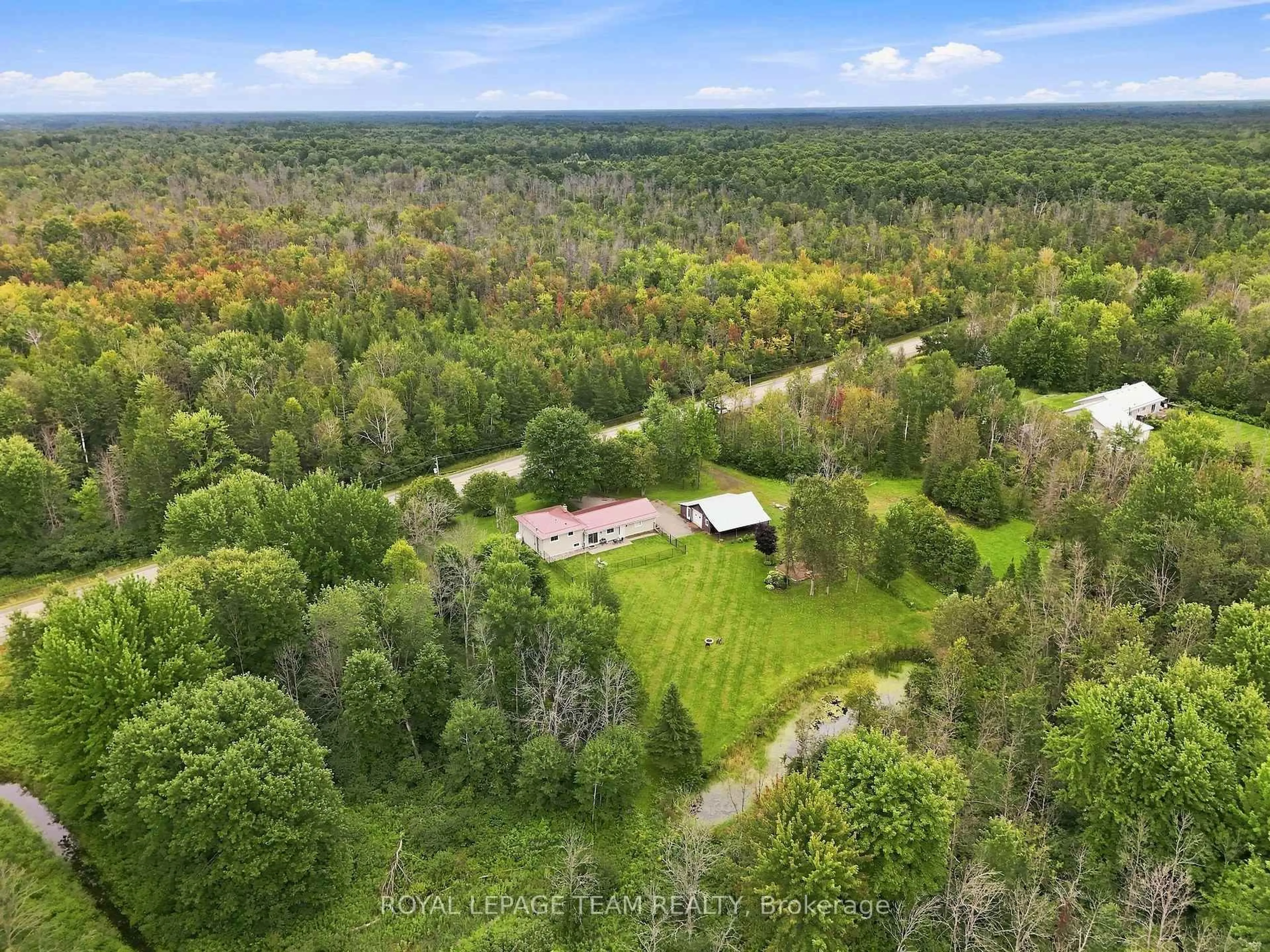 A pic from outside/outdoor area/front of a property/back of a property/a pic from drone, forest/trees view for 980 County Rd 44, North Grenville Ontario K0G 1T0