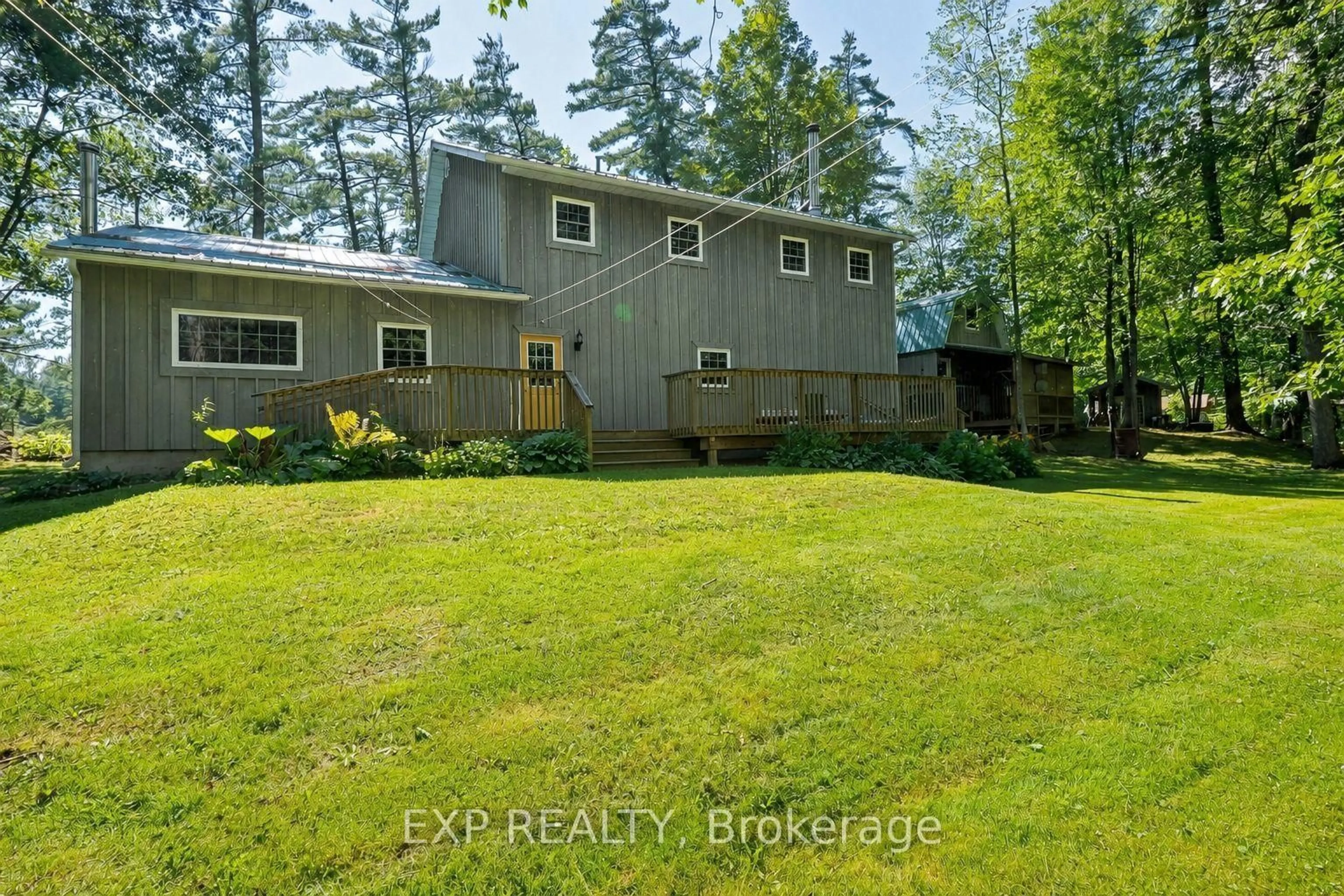 A pic from outside/outdoor area/front of a property/back of a property/a pic from drone, unknown for 14 Severn River #SR404, Muskoka Lakes Ontario P0C 1M0