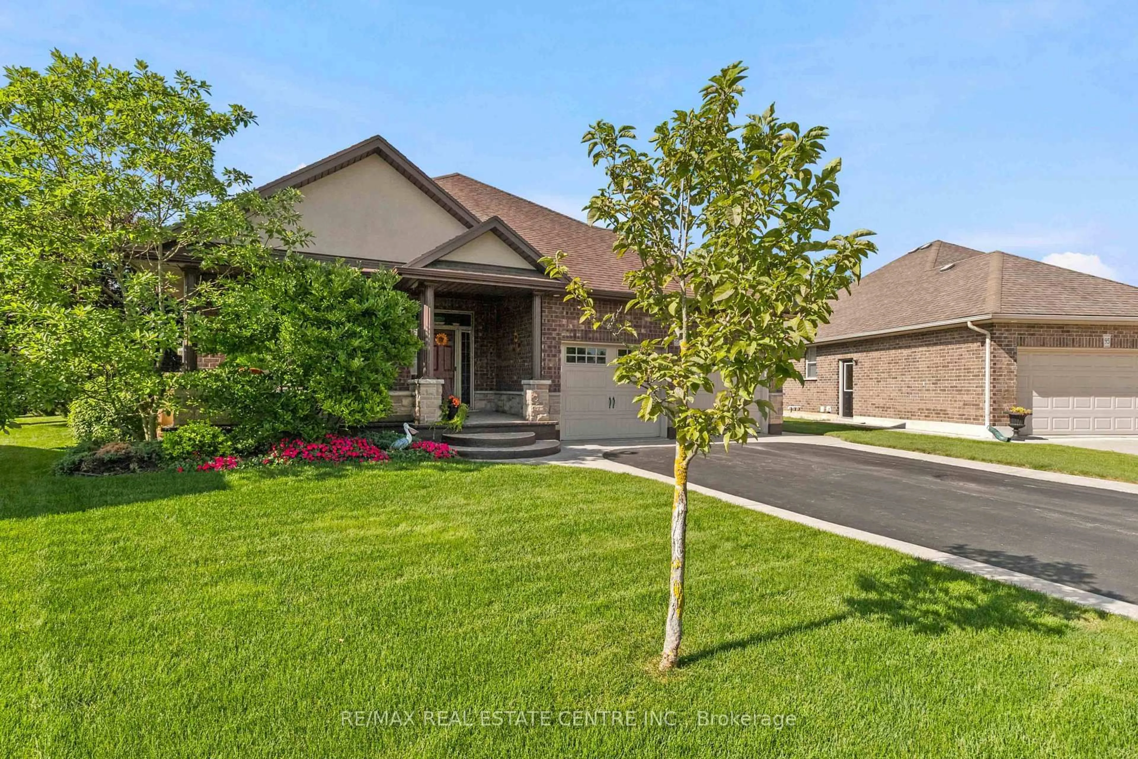 Home with brick exterior material, street for 99 Magnolia Dr, Norfolk Ontario N0A 1N6