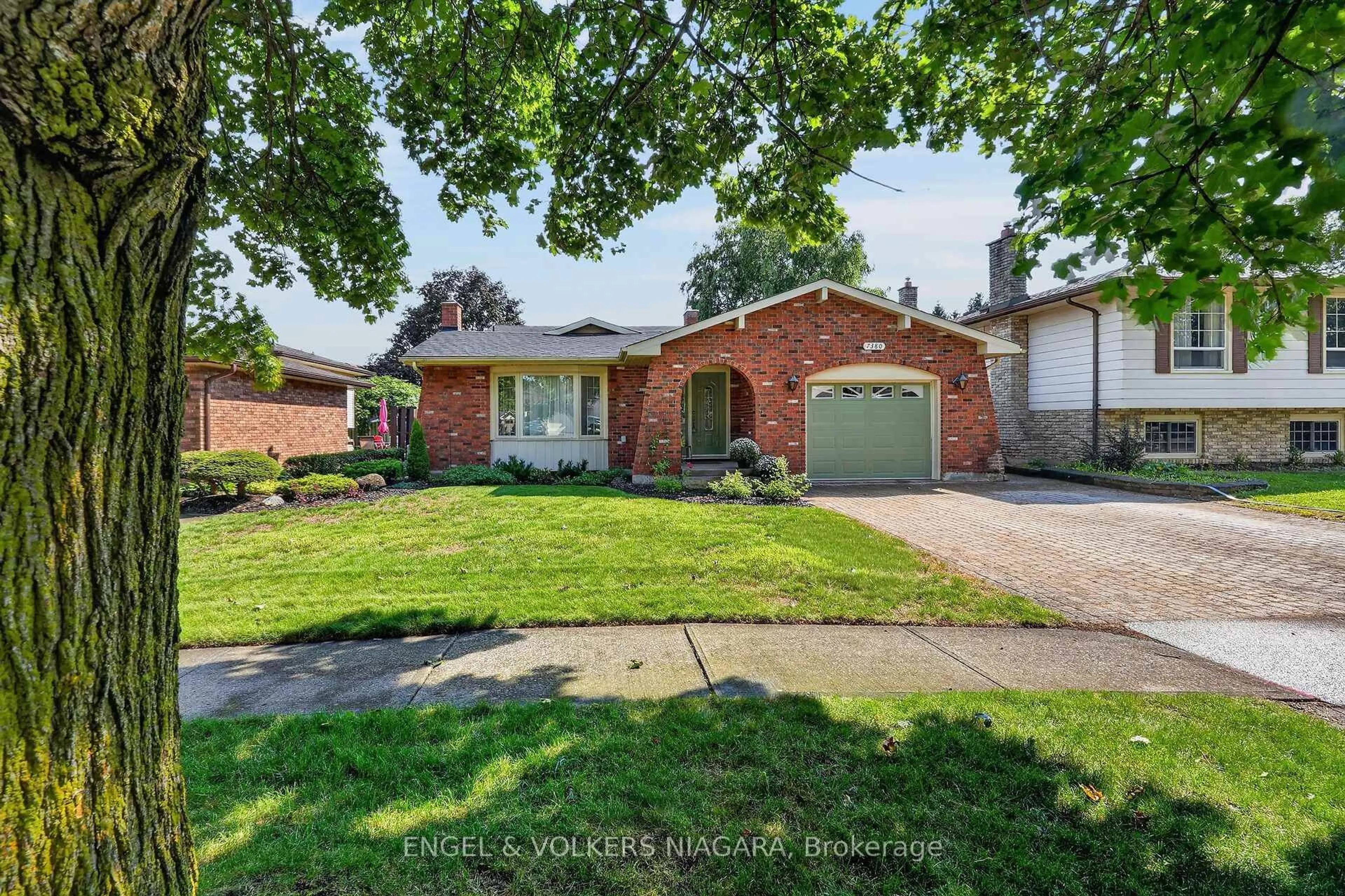Home with brick exterior material, street for 7380 Green Boughs Rd, Niagara Falls Ontario L2J 4C2