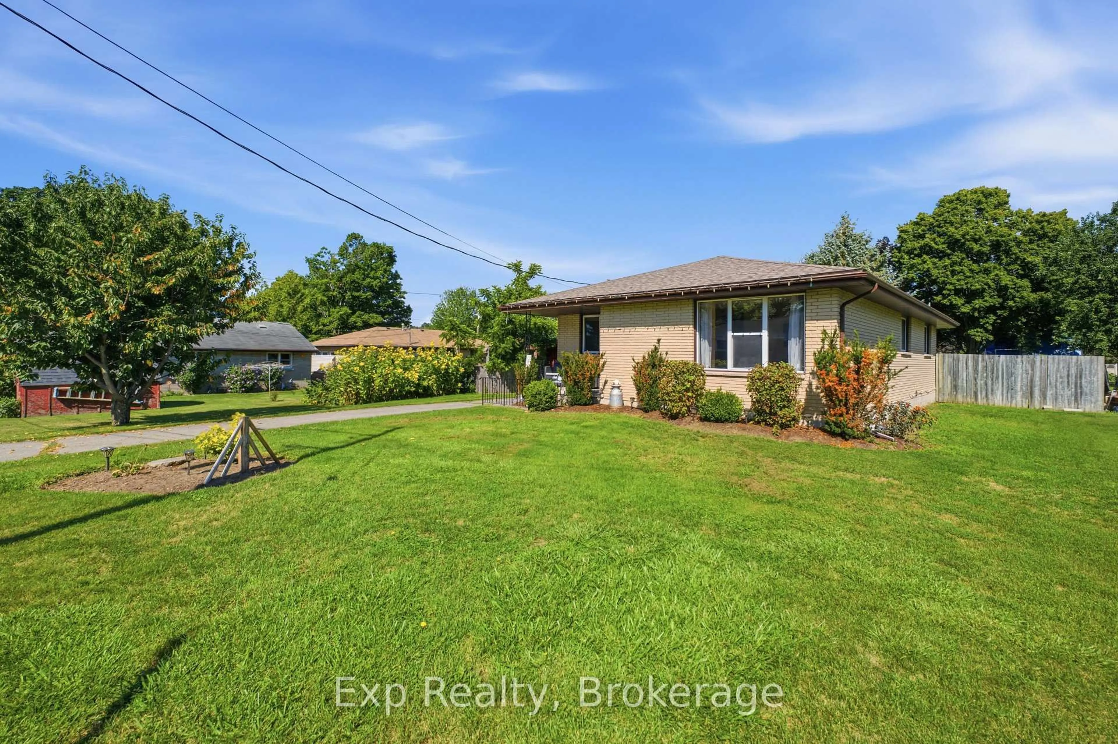 A pic from outside/outdoor area/front of a property/back of a property/a pic from drone, water/lake/river/ocean view for 18 Railway St, Brighton Ontario K0K 1H0