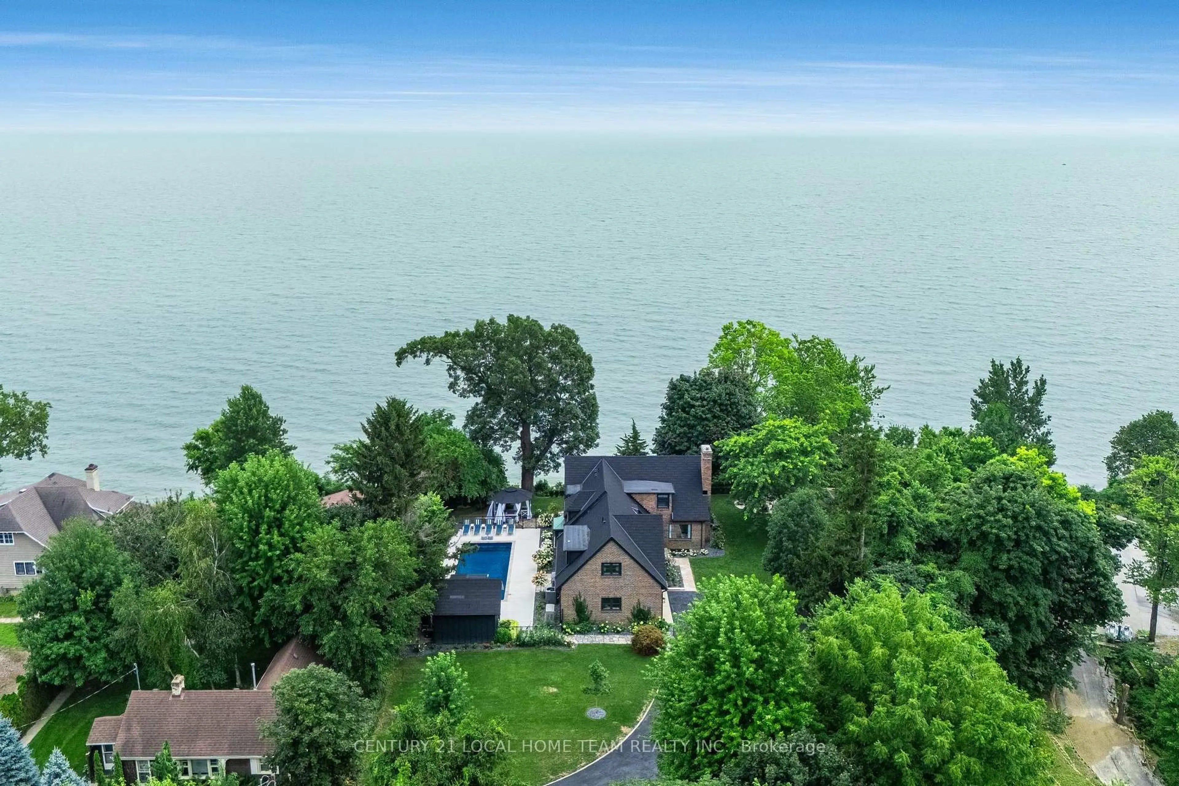 A pic from outside/outdoor area/front of a property/back of a property/a pic from drone, water/lake/river/ocean view for 24 Bayshore Dr, Leamington Ontario N8H 4A8