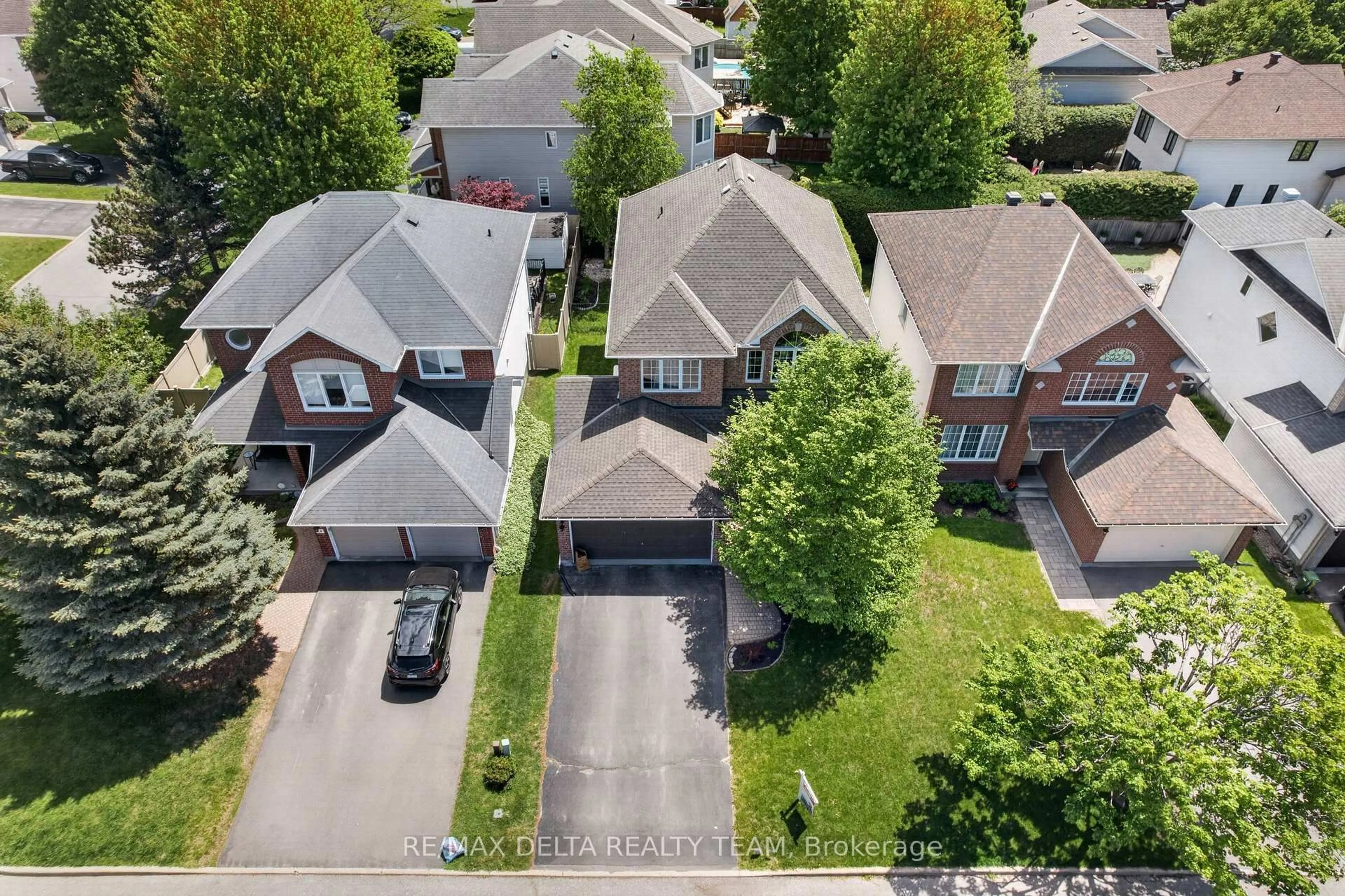 A pic from outside/outdoor area/front of a property/back of a property/a pic from drone, street for 46 Birchfield Ave, Kanata Ontario K2M 2N5
