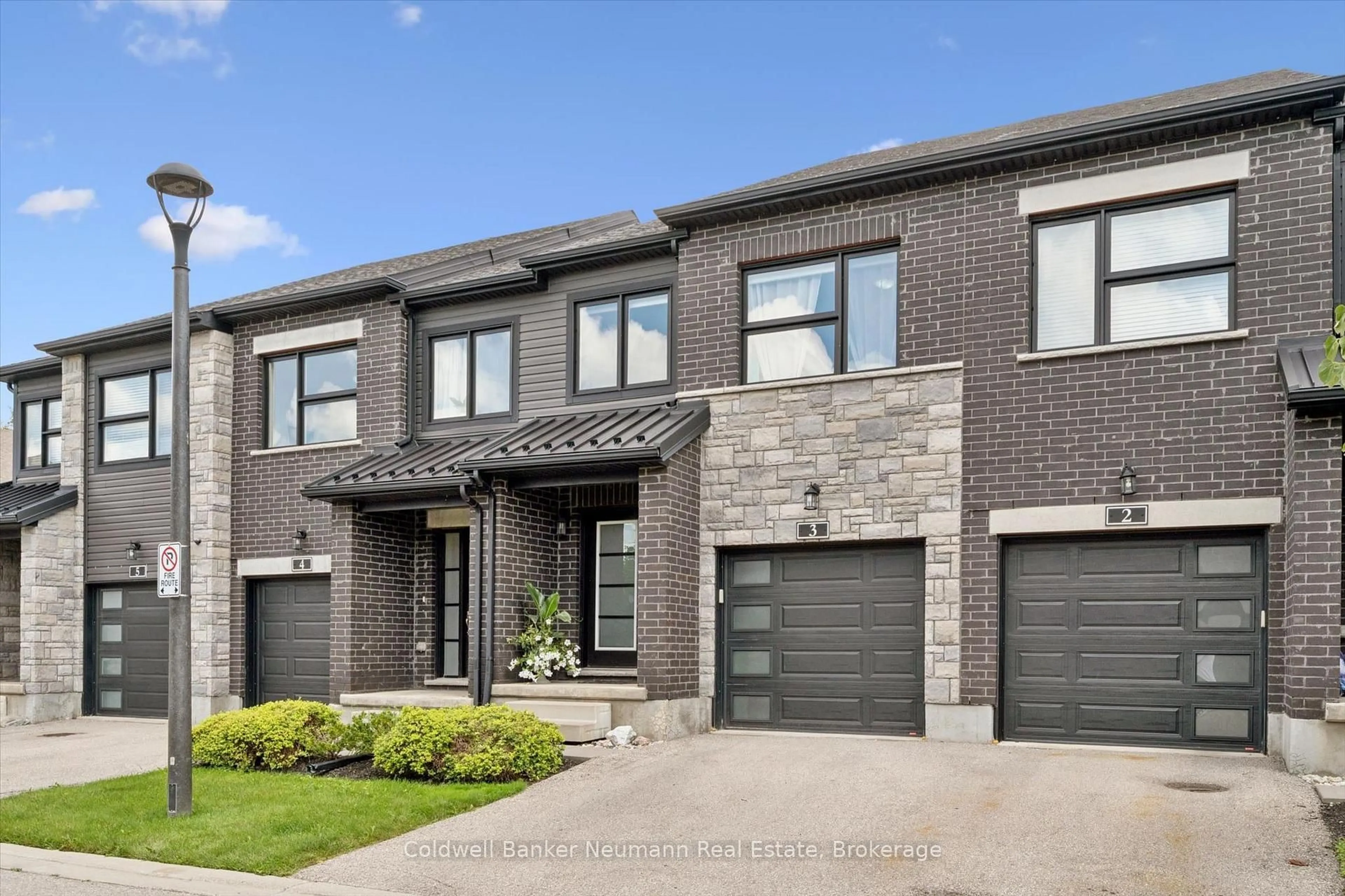 Home with brick exterior material, street for 91 Poppy Dr #3, Guelph Ontario N1L 0M6