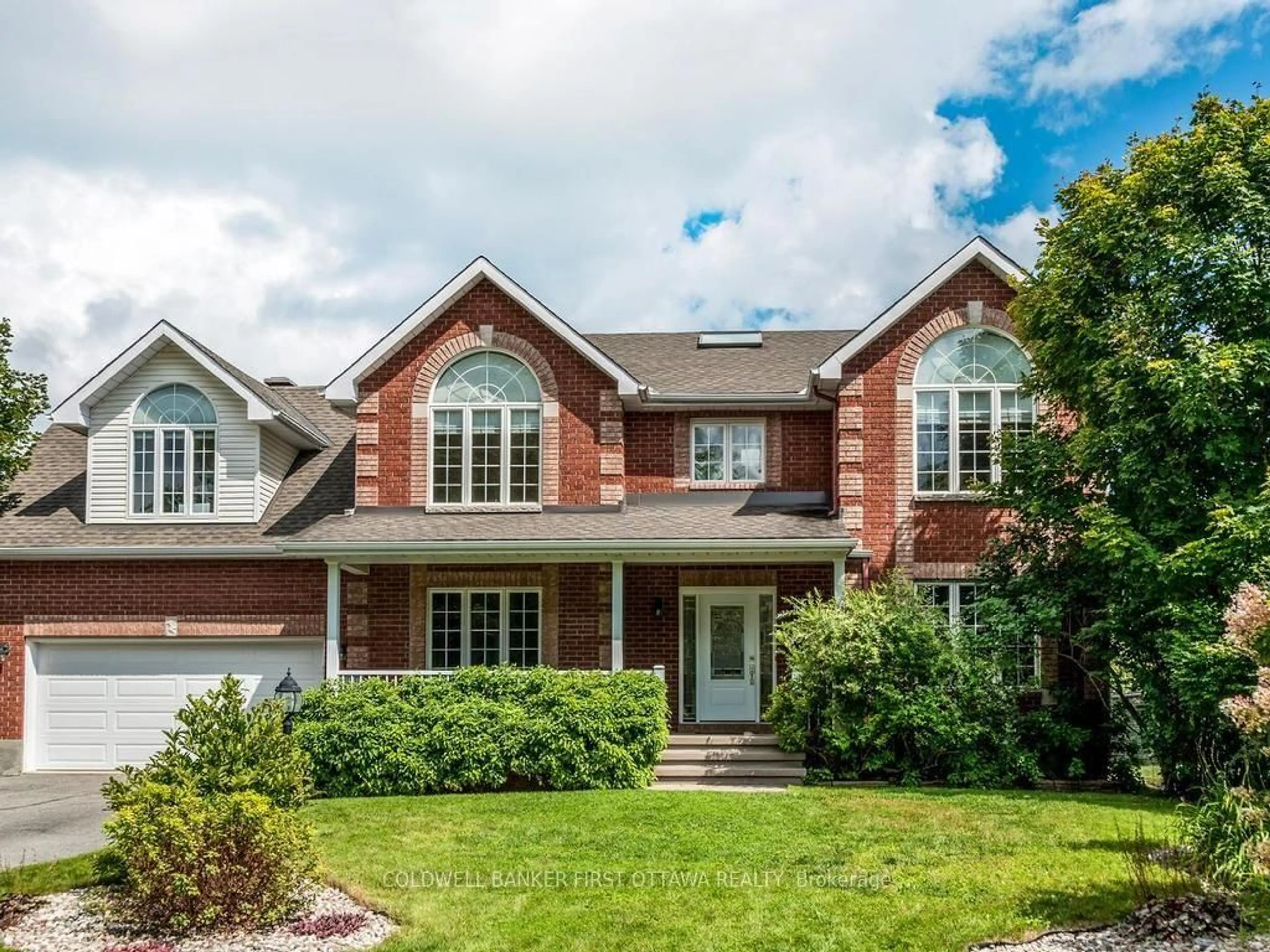 Home with brick exterior material, street for 5 Hearn Cres, Stittsville Ontario K2S 1R7