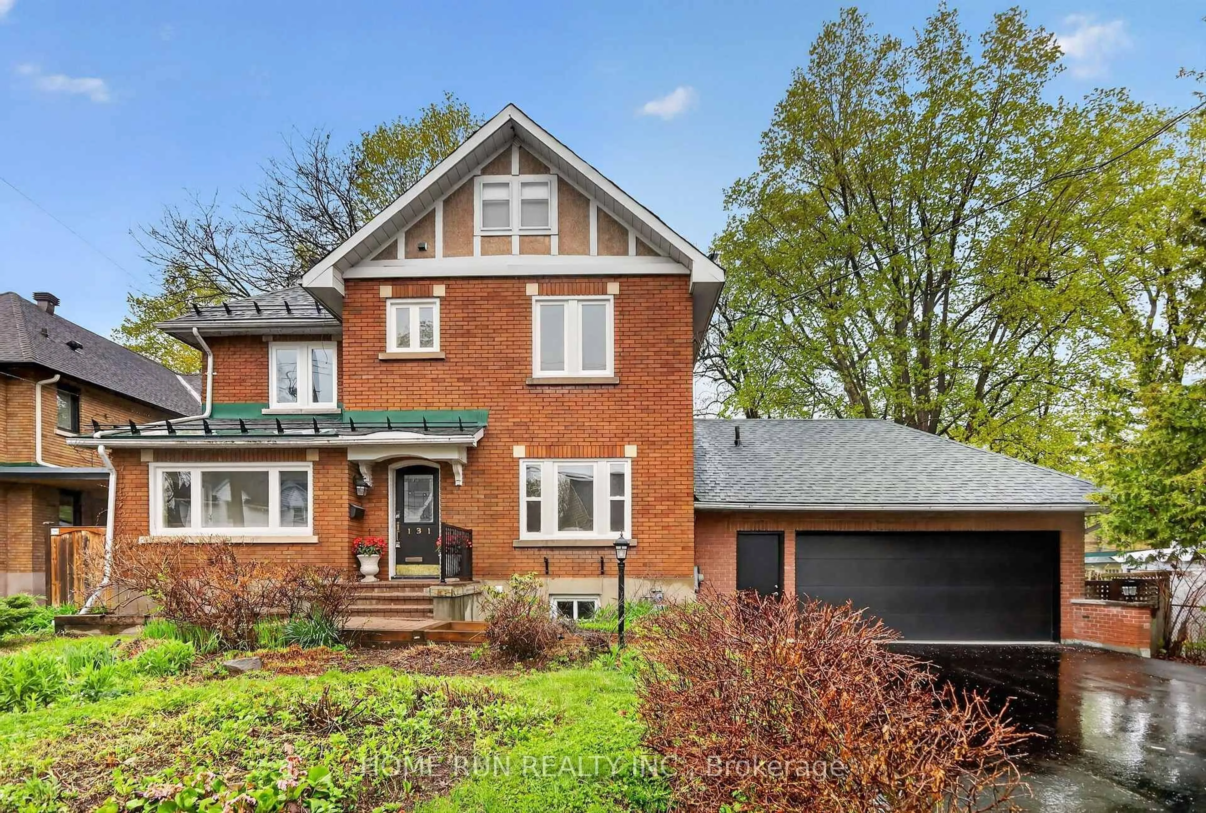 Home with brick exterior material, street for 131 Acacia Ave, Ottawa Ontario K1M 0R2