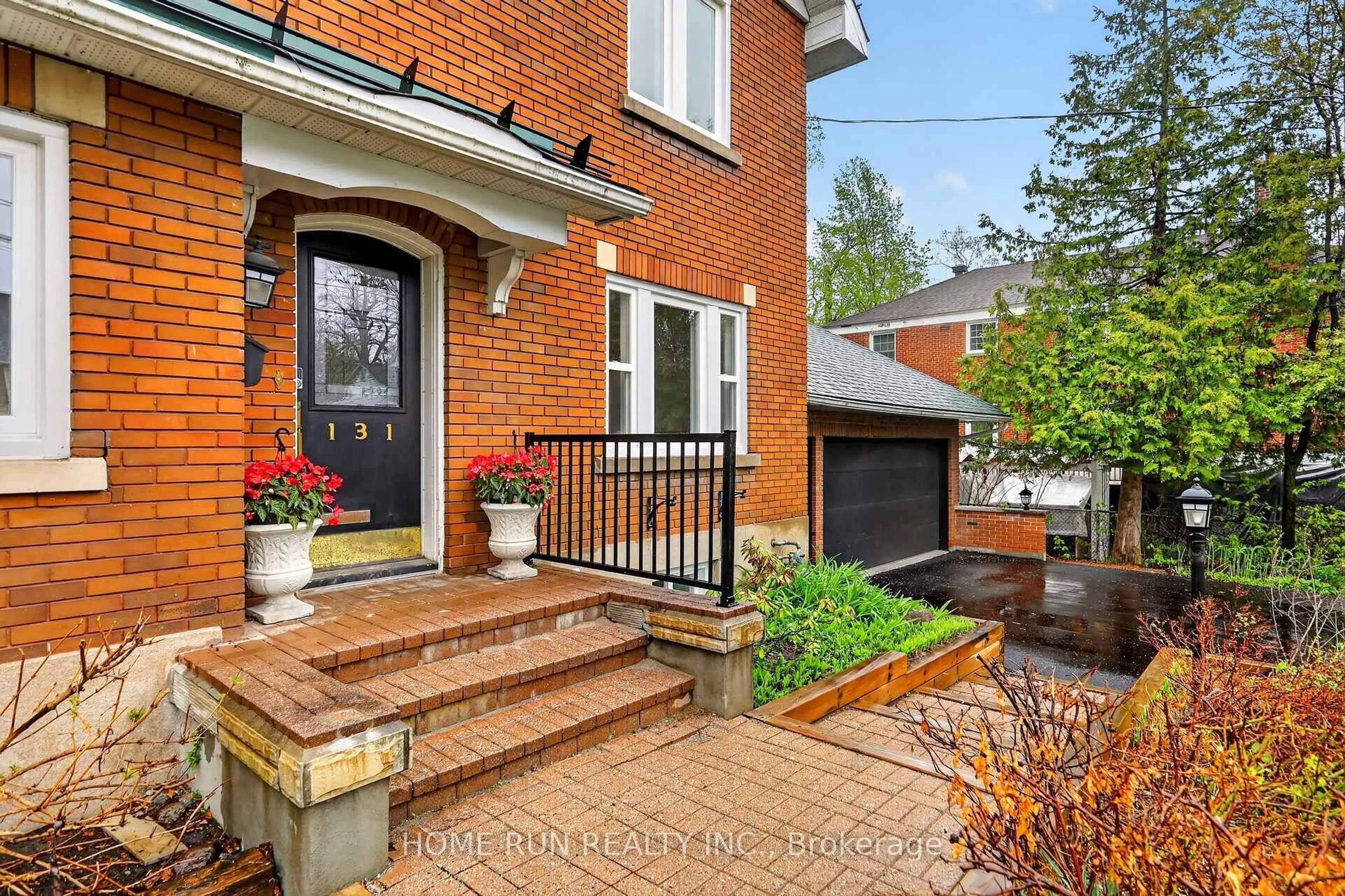 Home with brick exterior material, street for 131 Acacia Ave, Ottawa Ontario K1M 0R2
