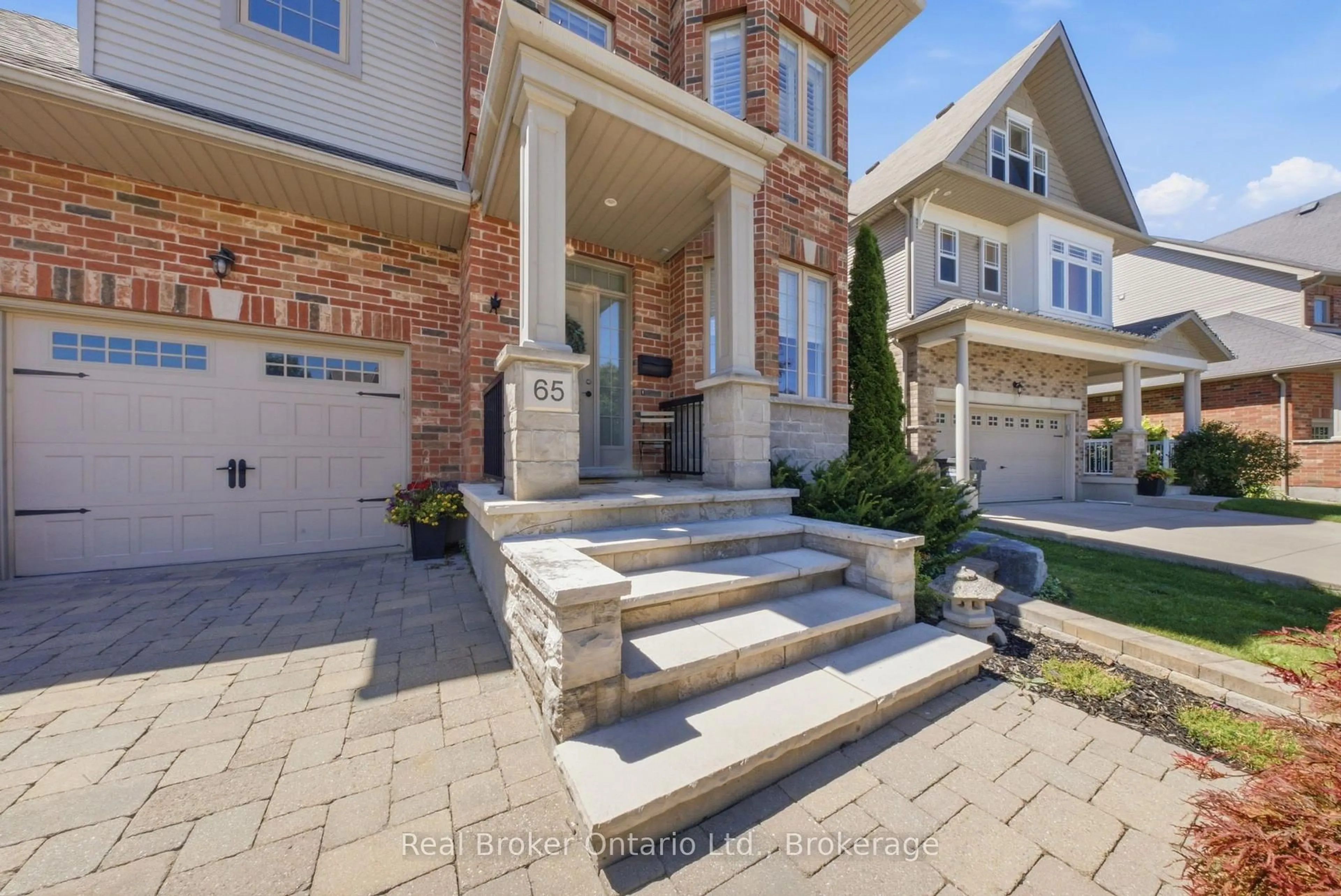 Home with brick exterior material, street for 65 Amsterdam Cres, Guelph Ontario N1L 0G2