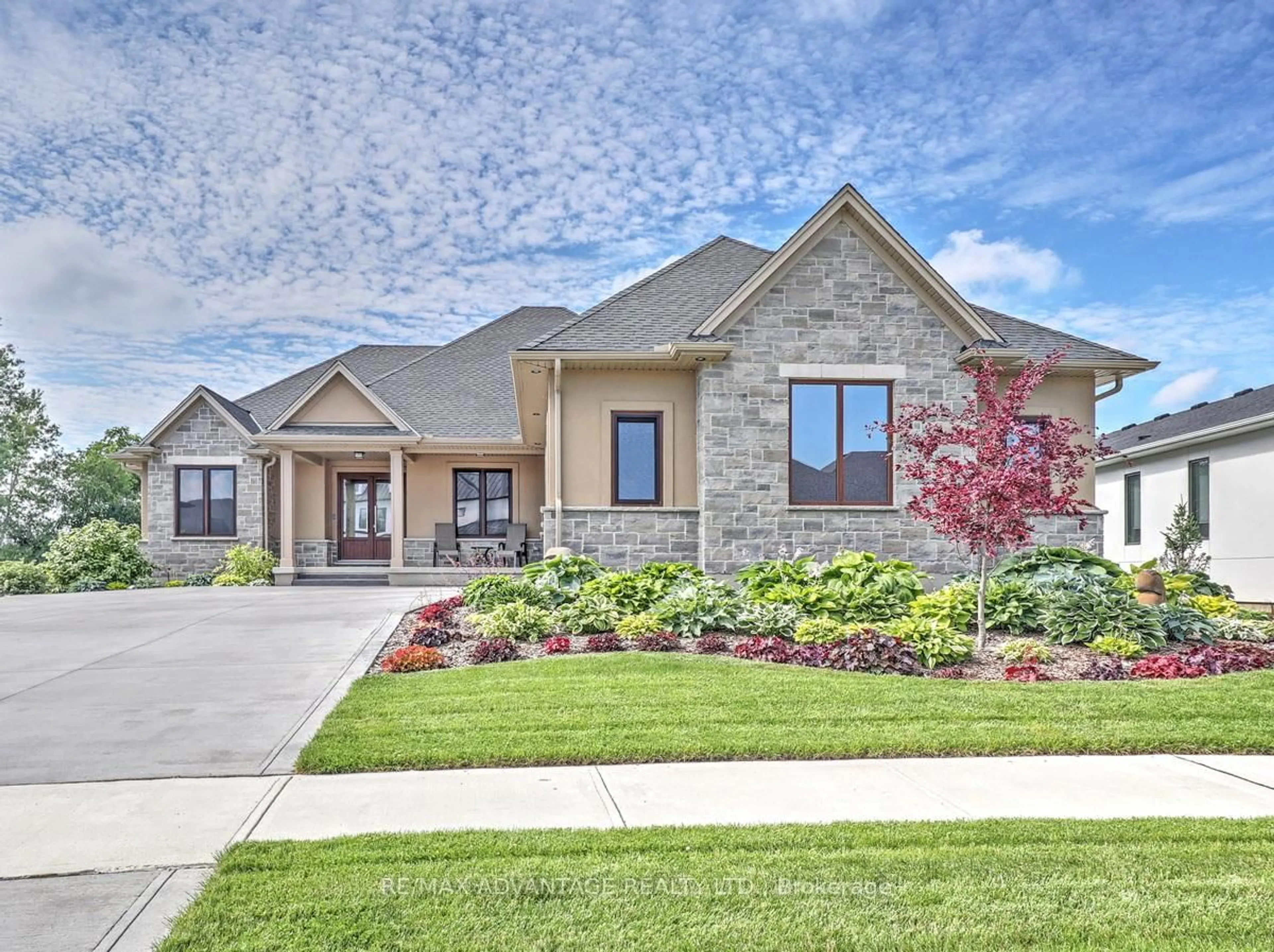 Home with brick exterior material, street for 240 Edgewater Blvd, Middlesex Centre Ontario N0L 1R0