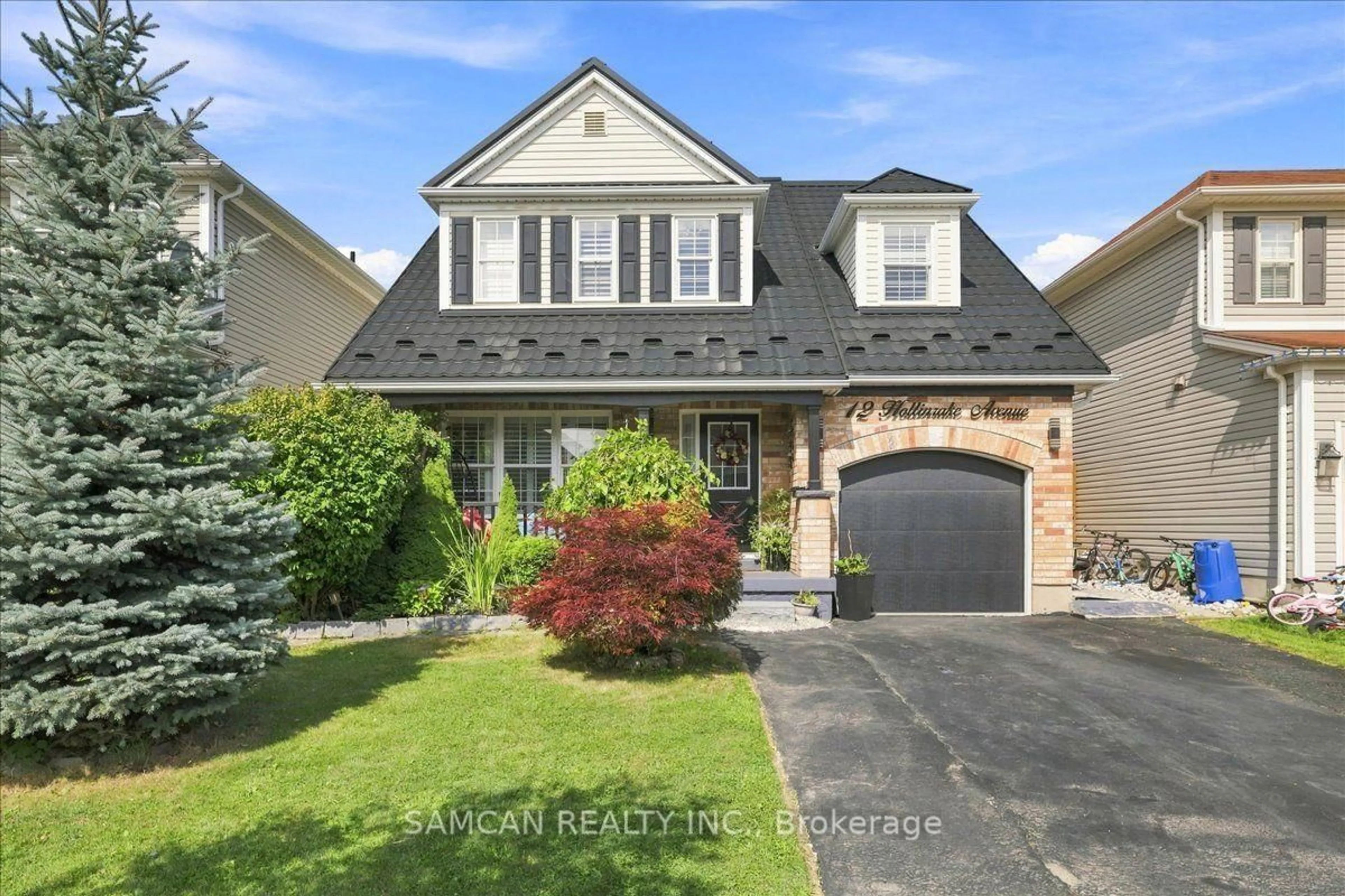 Home with brick exterior material, street for 12 Hollinrake Ave, Brantford Ontario N3T 0A6