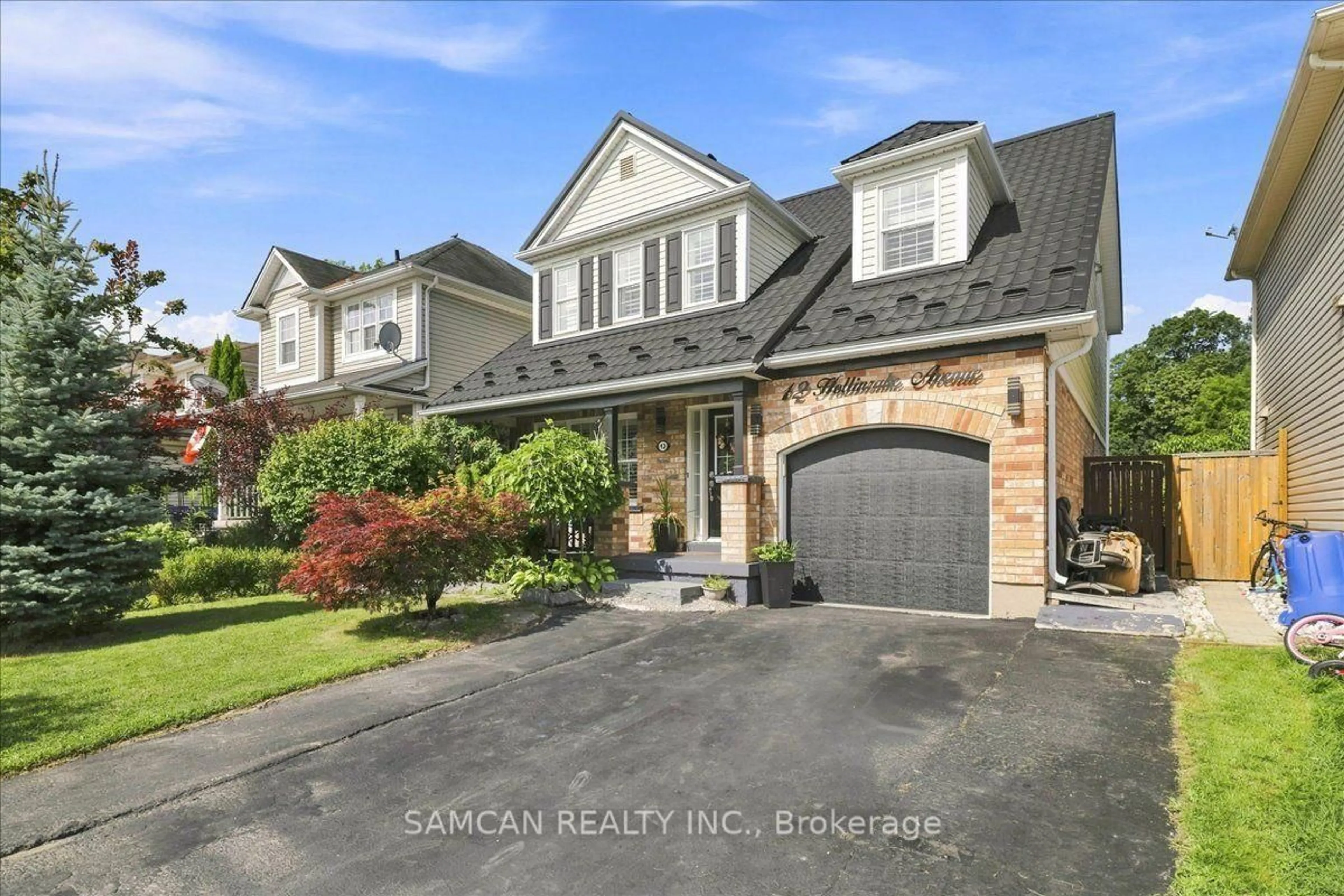 Home with brick exterior material, street for 12 Hollinrake Ave, Brantford Ontario N3T 0A6