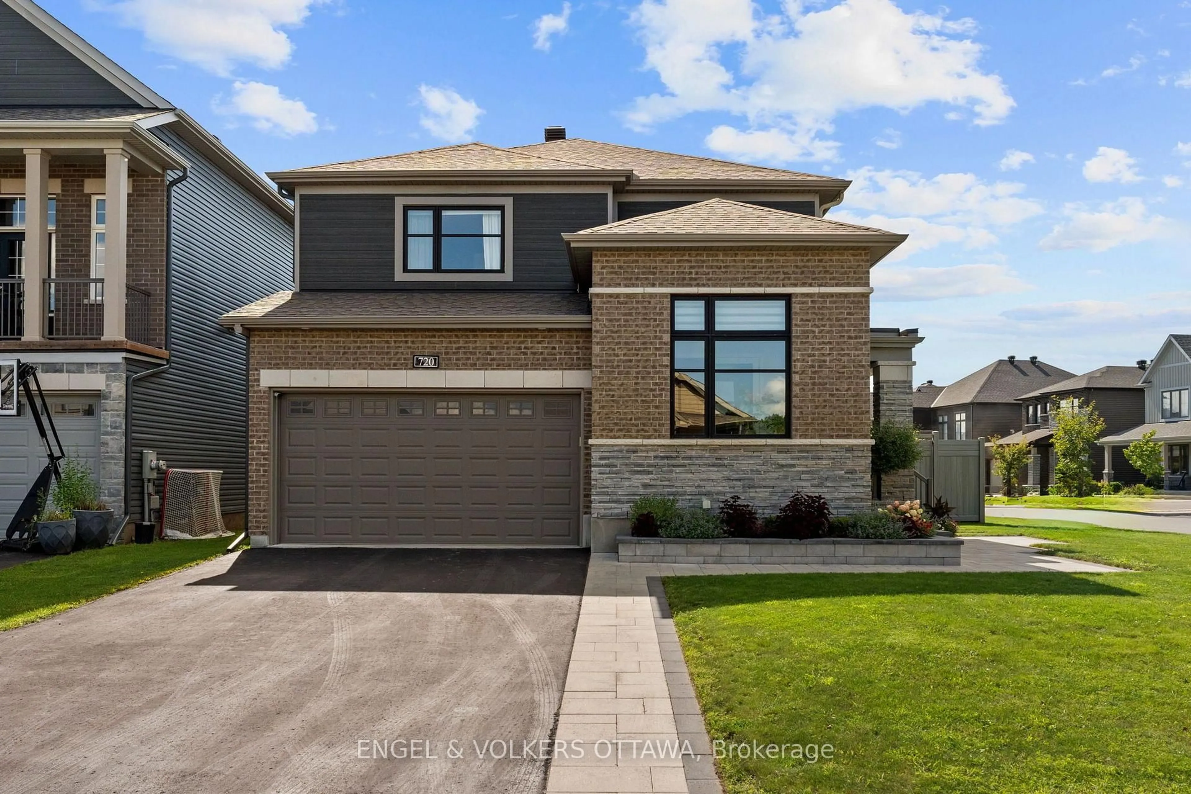 Home with brick exterior material, street for 720 Coast Circ, Manotick Ontario K4M 0N2