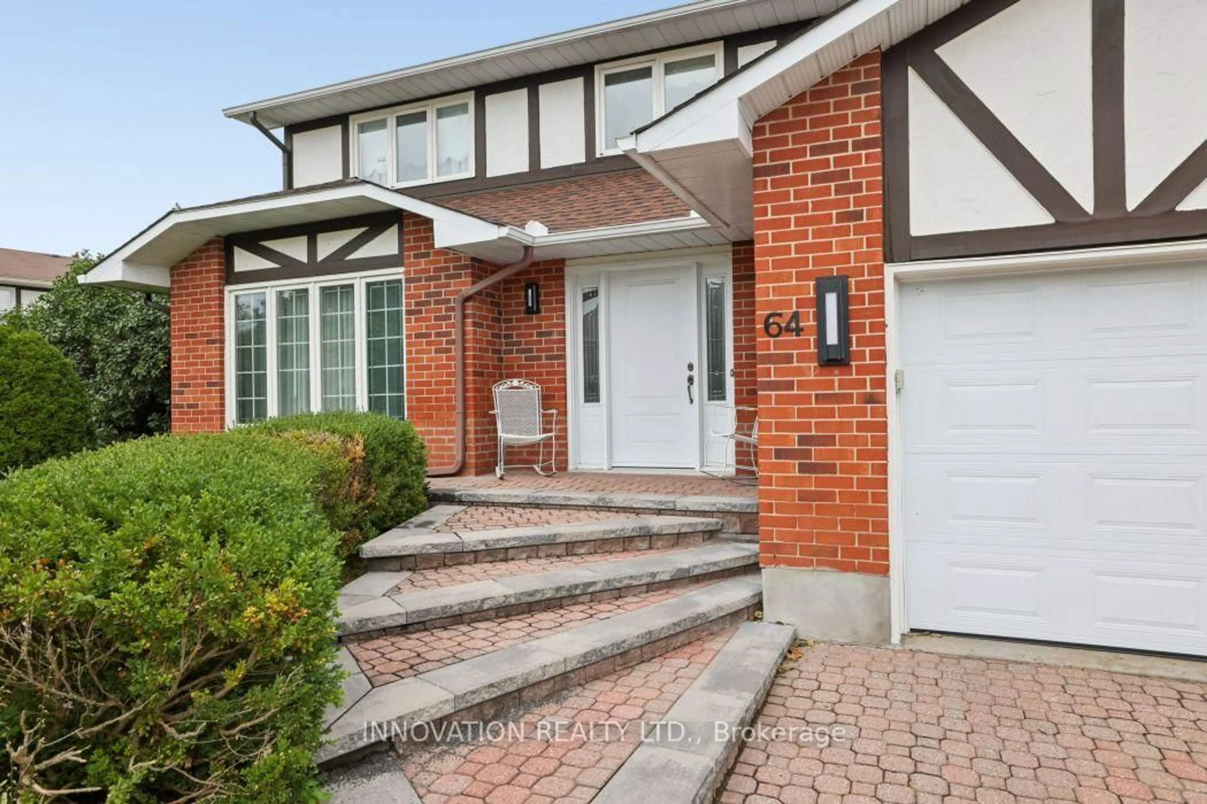 Home with brick exterior material, street for 64 Thare Cres, Barrhaven Ontario K2J 2P6