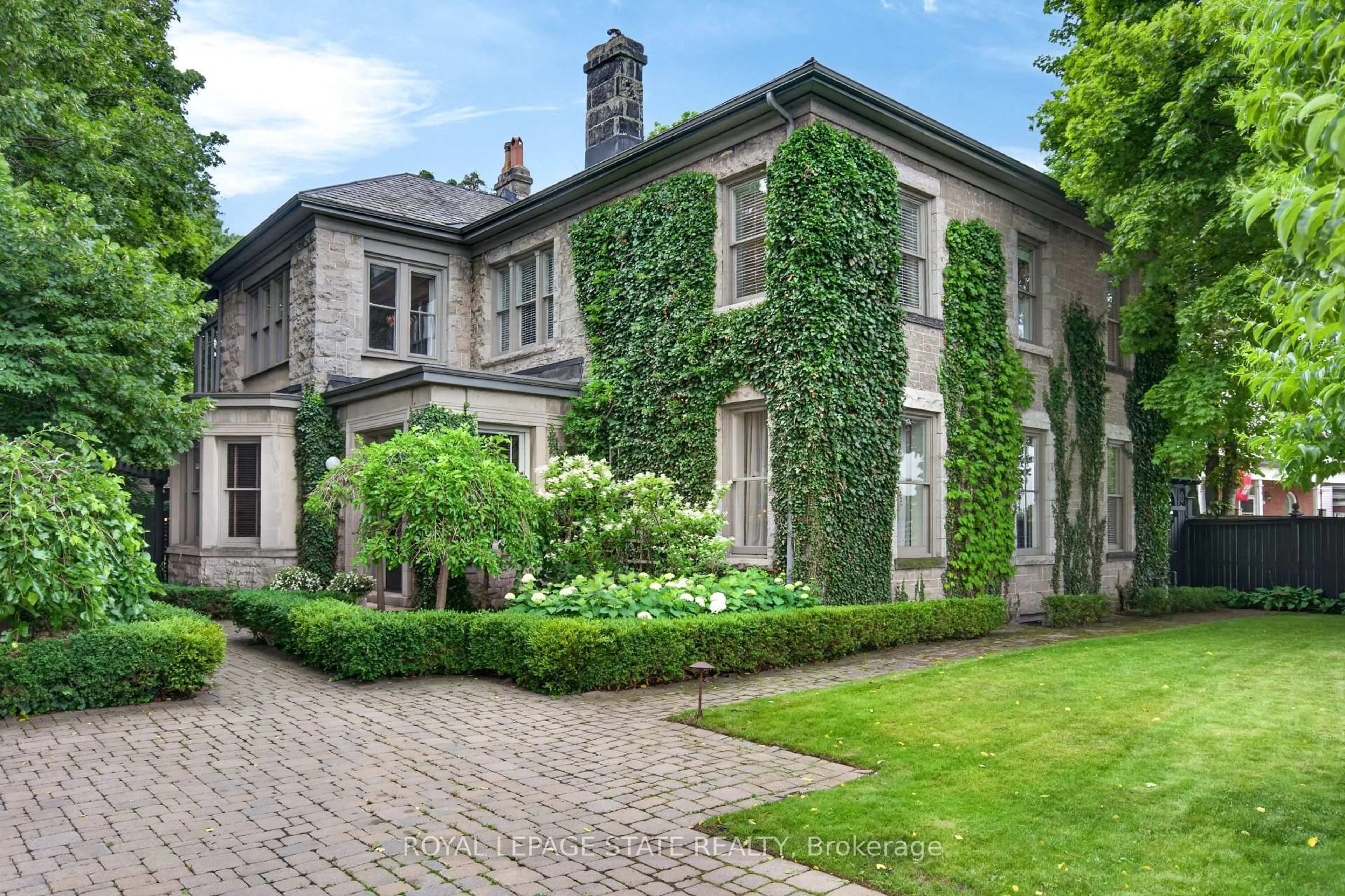 Home with brick exterior material, street for 77 Claremont Dr, Hamilton Ontario L9C 3N4
