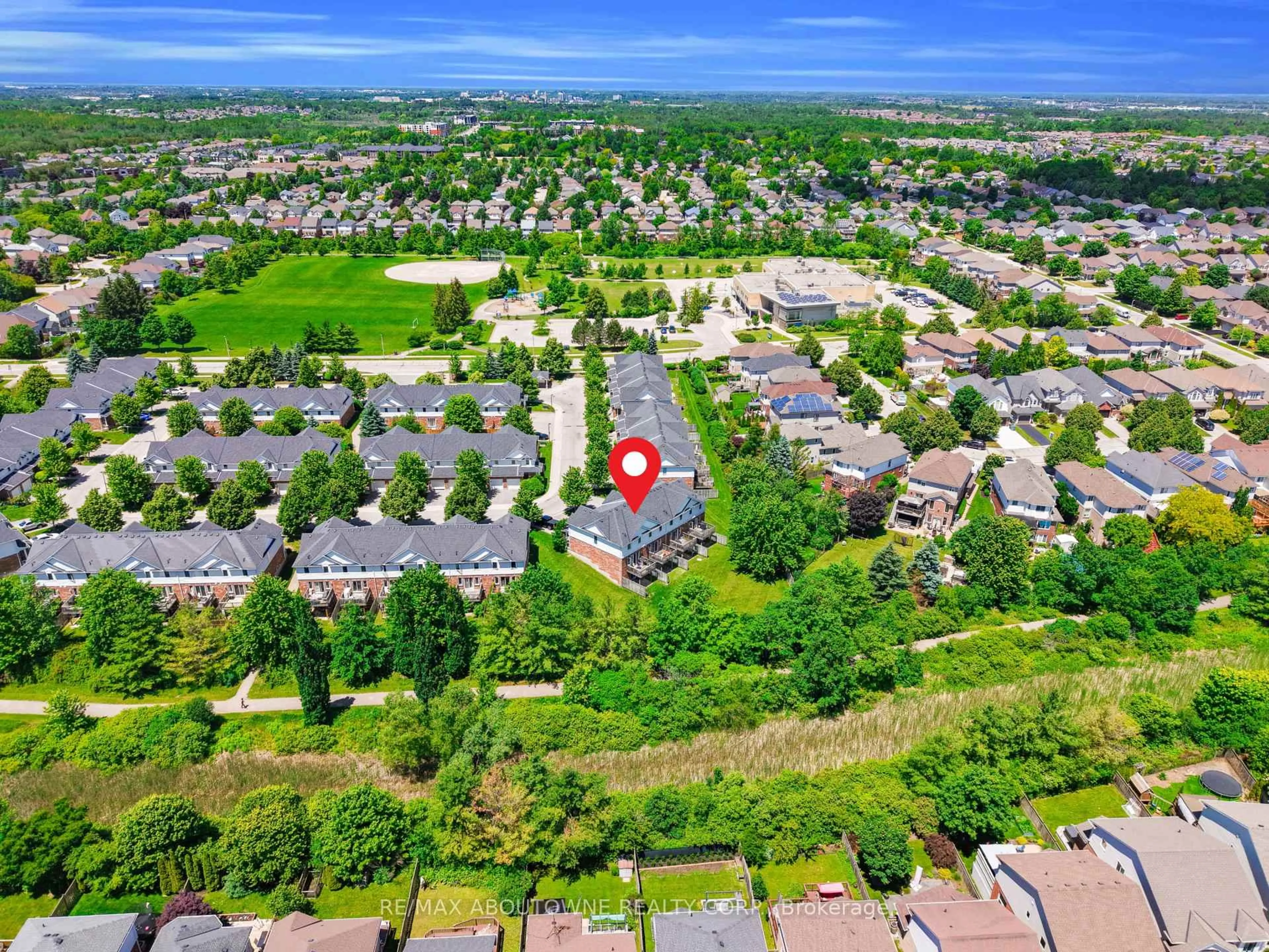 A pic from outside/outdoor area/front of a property/back of a property/a pic from drone, unknown for 151 Clairfields Dr #15, Guelph Ontario N1L 1P5