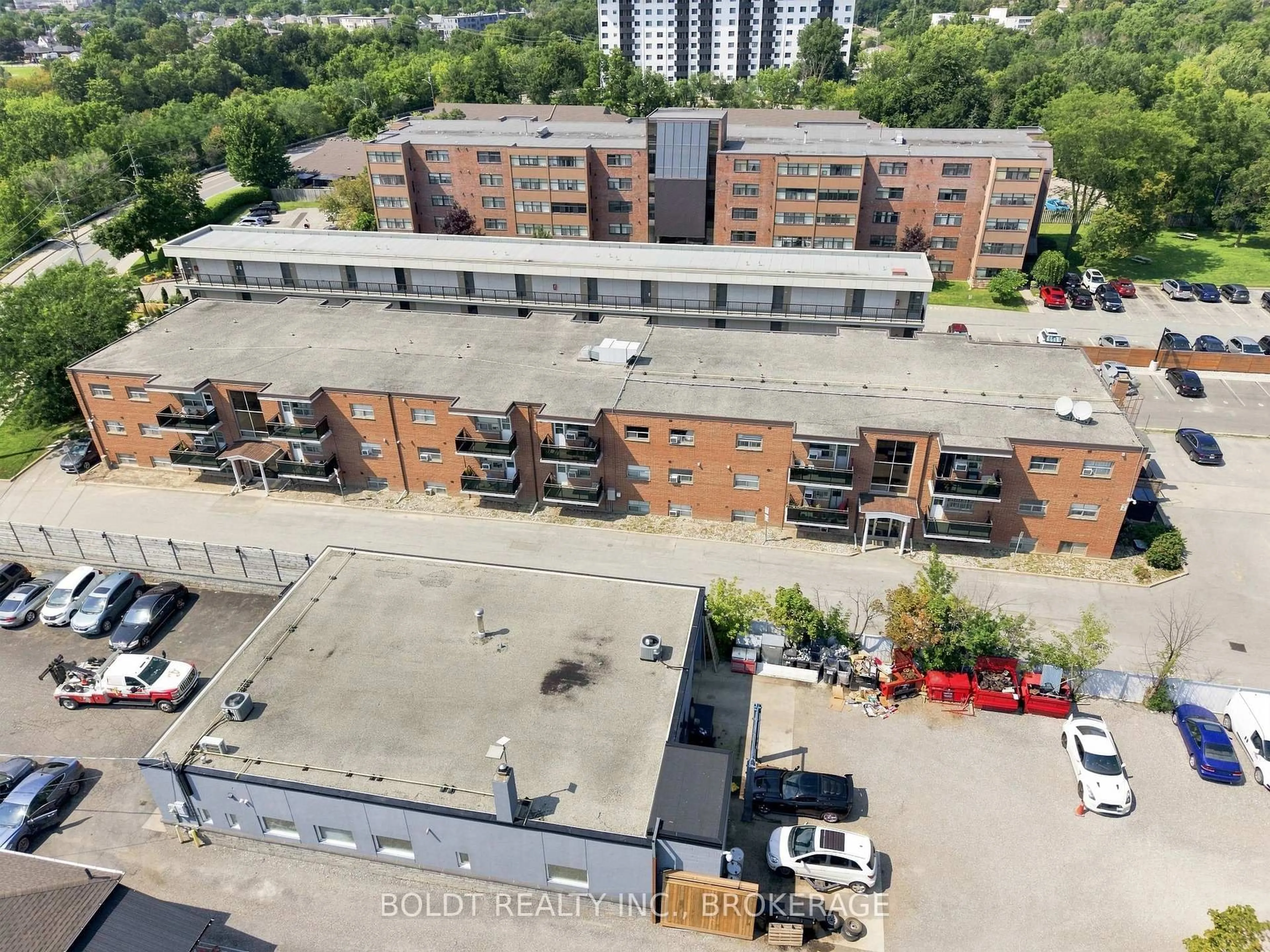 A pic from outside/outdoor area/front of a property/back of a property/a pic from drone, city buildings view from balcony for 264 Oakdale Ave #307, St. Catharines Ontario L2P 2K4
