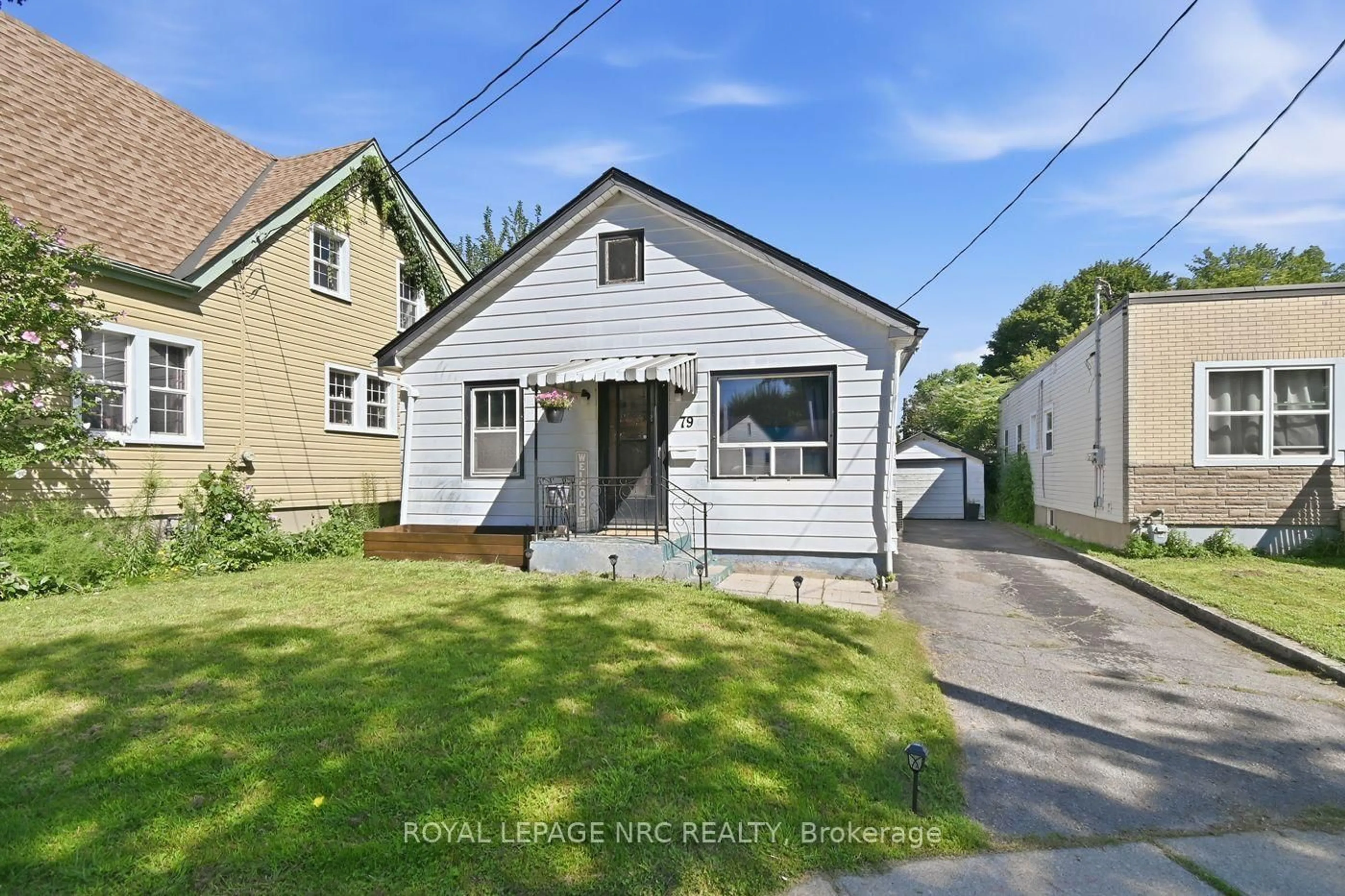 A pic from outside/outdoor area/front of a property/back of a property/a pic from drone, street for 79 Carlton St, St. Catharines Ontario L2R 1R1