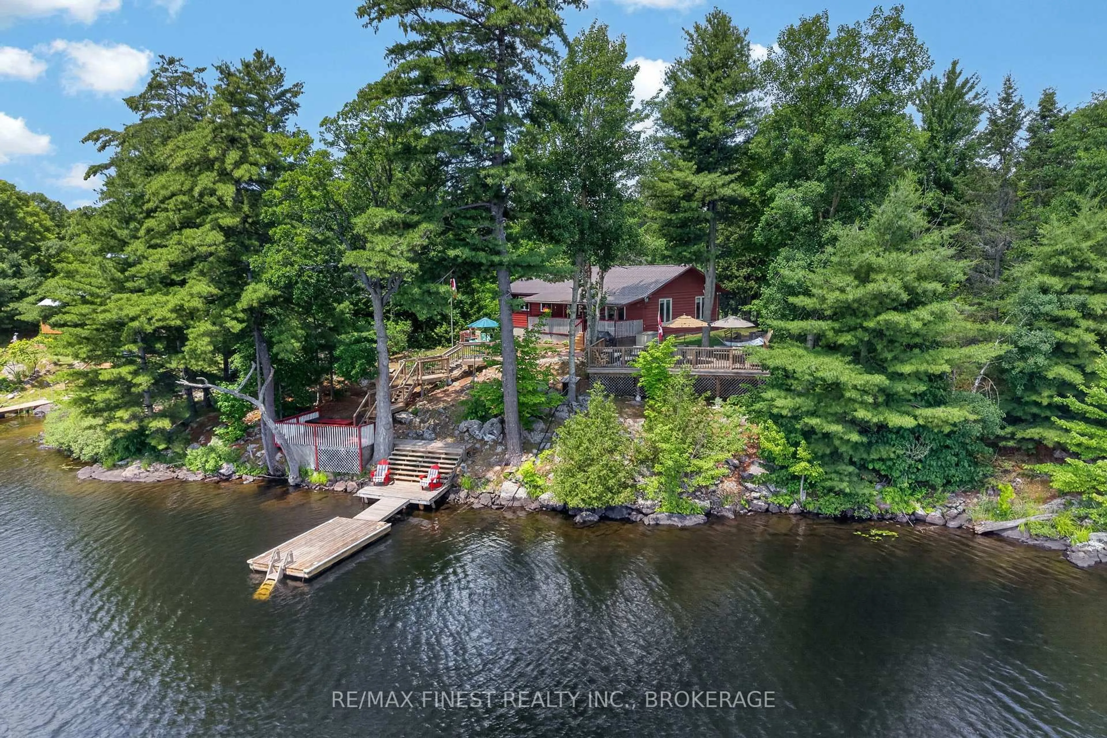 A pic from outside/outdoor area/front of a property/back of a property/a pic from drone, water/lake/river/ocean view for 1067 Island View Lane, Parham Ontario K0H 2K0