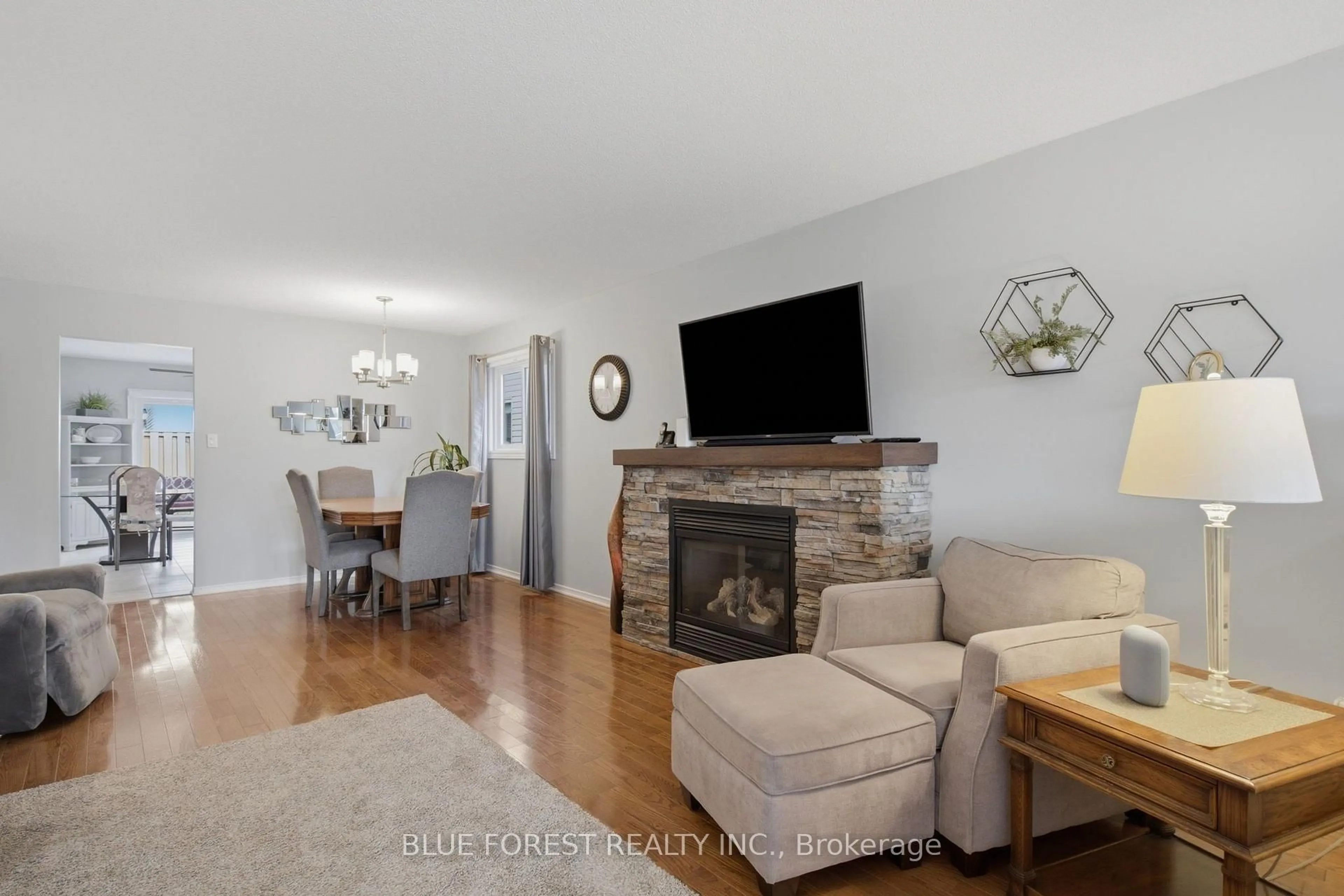 Living room with furniture, wood/laminate floor for 335 Lighthouse Rd #28, London South Ontario N6M 1J8